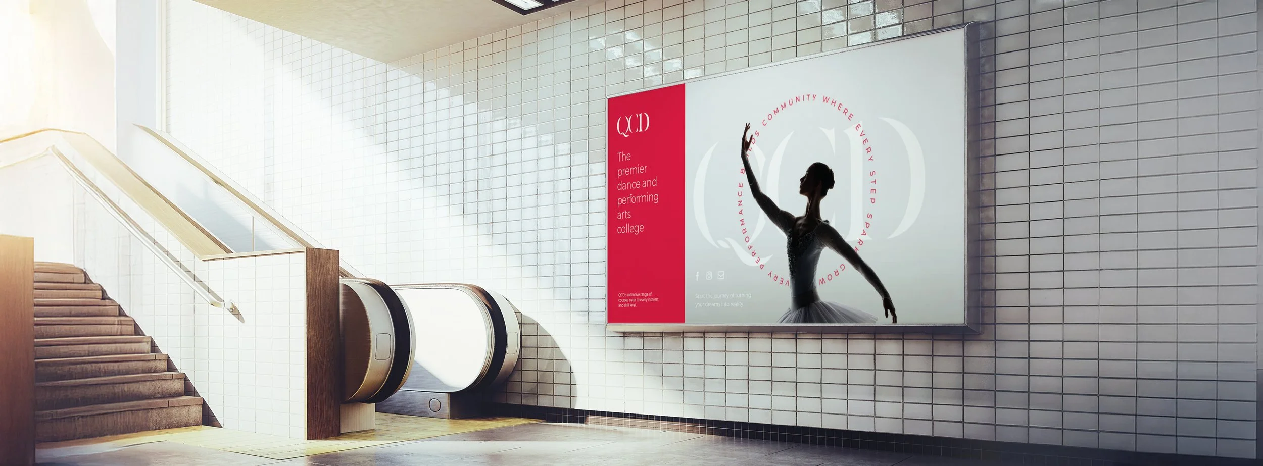 An escalator next to a wall with a large poster advertising a dance and performing arts college, featuring a ballerina silhouette and red and white design.
