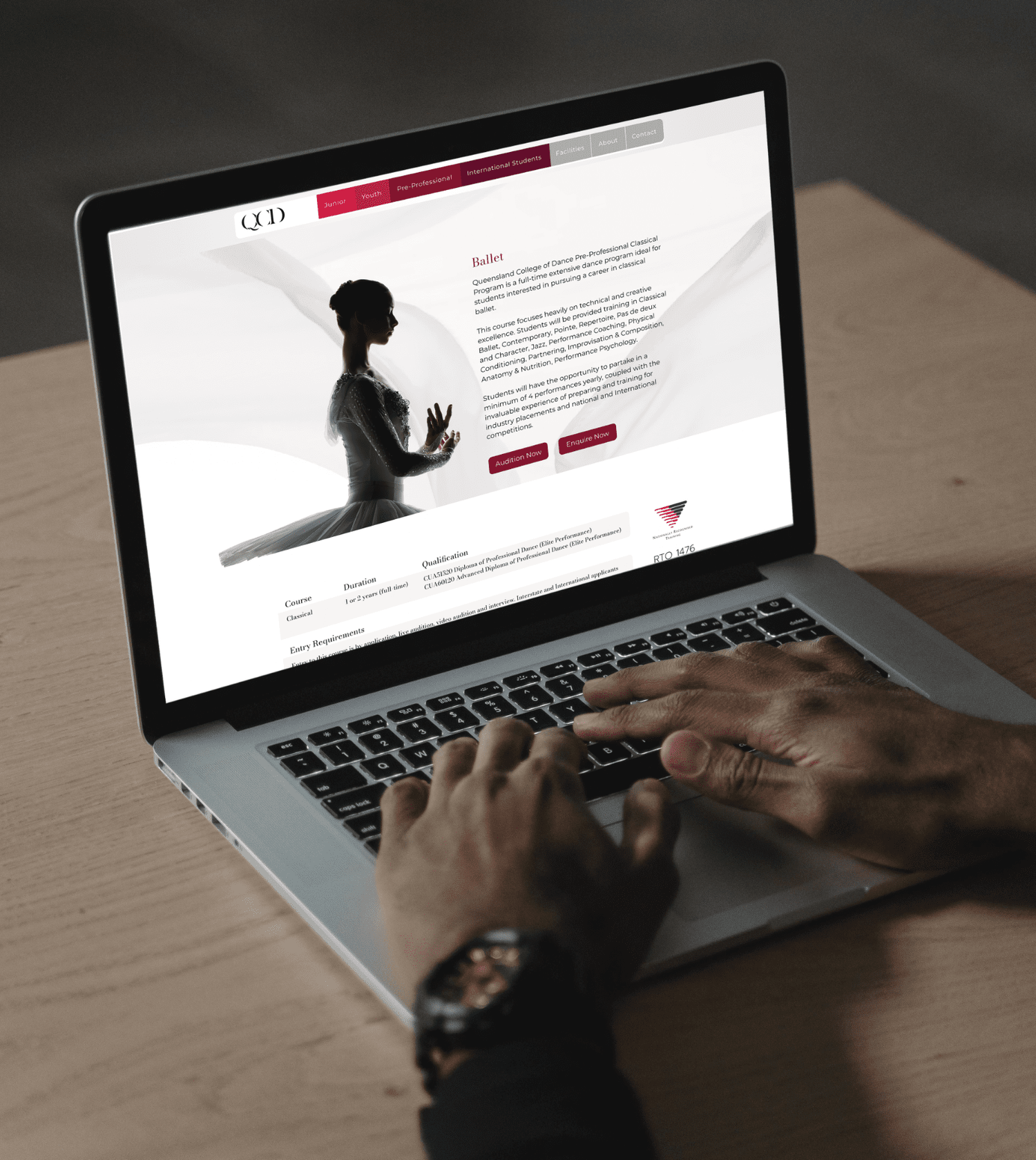 QLD College of Dance website on a laptop