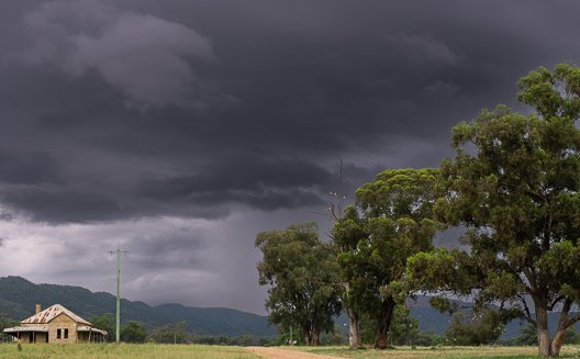 I stayed to see the storm build, but the light faded with it; I could still feel the energy of that storm as it rose above the hills.