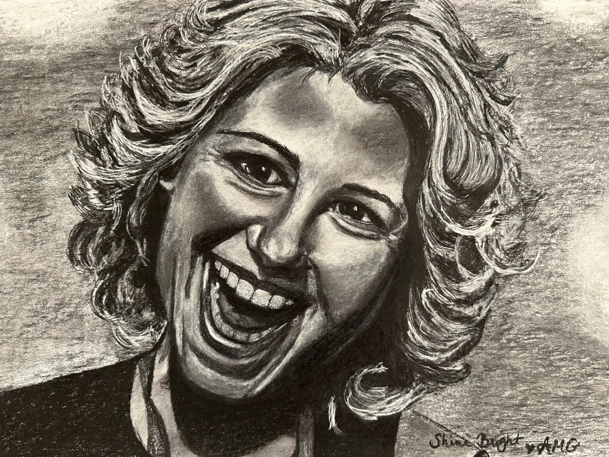 Charcoal portraits of loved ones