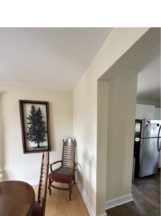 Before photo of Canmore kitchen showing closed wall layout prior to renovation