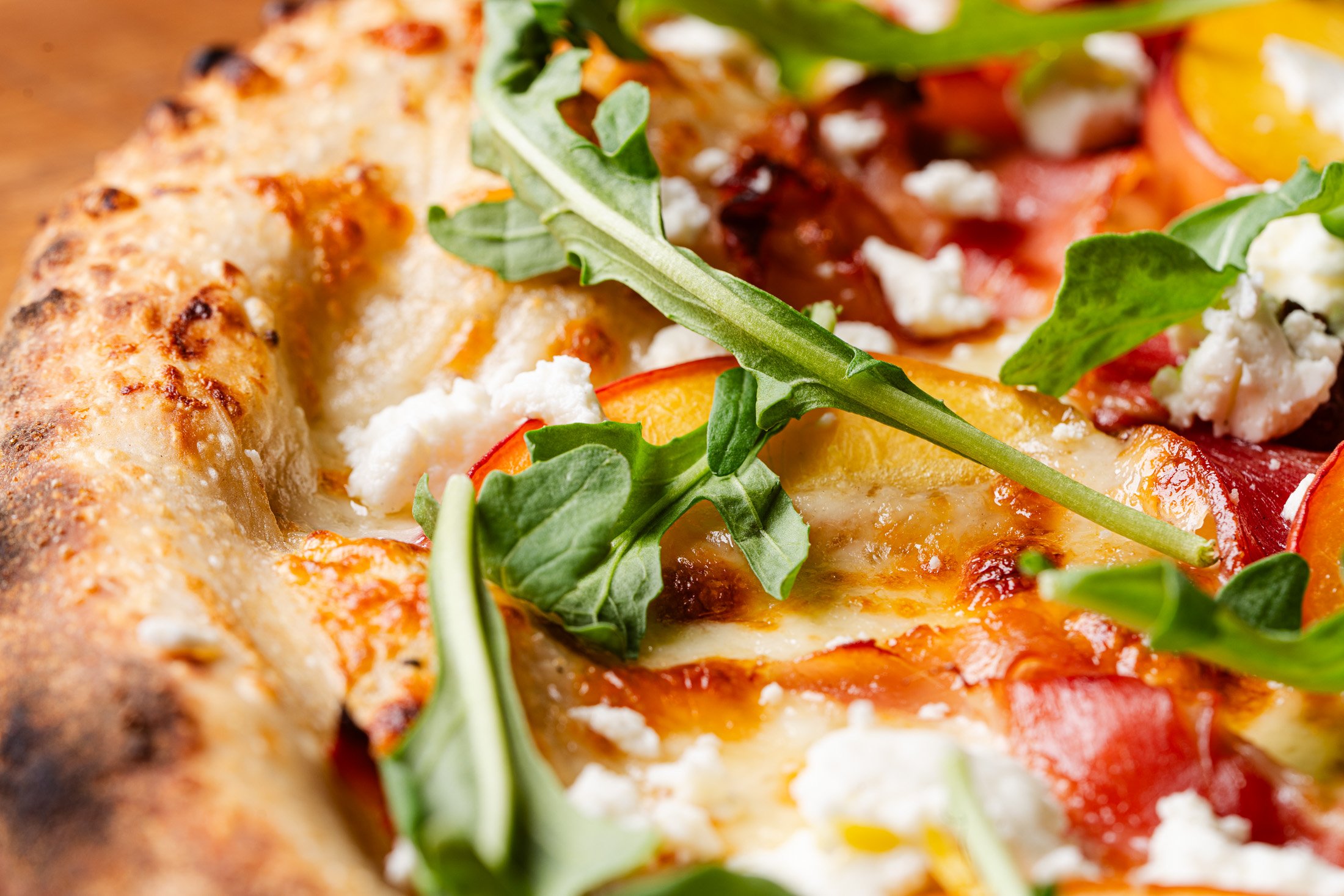 The perfectly baked crust and toppings of the Genevieve special.