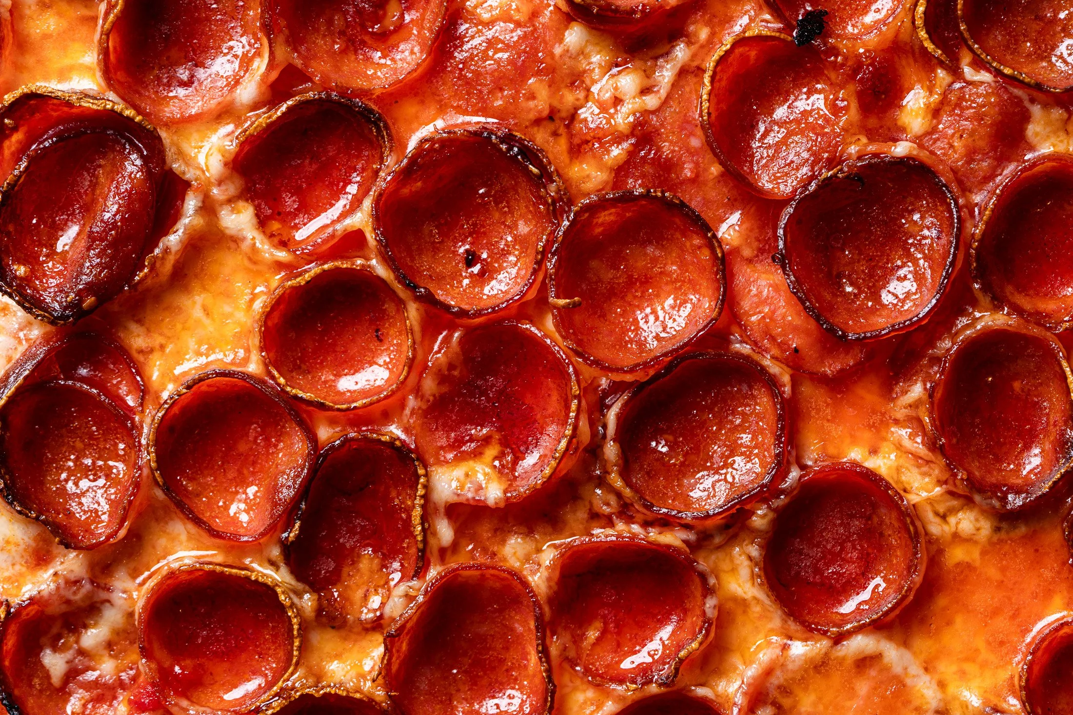 detail view of pepperonis and cheese