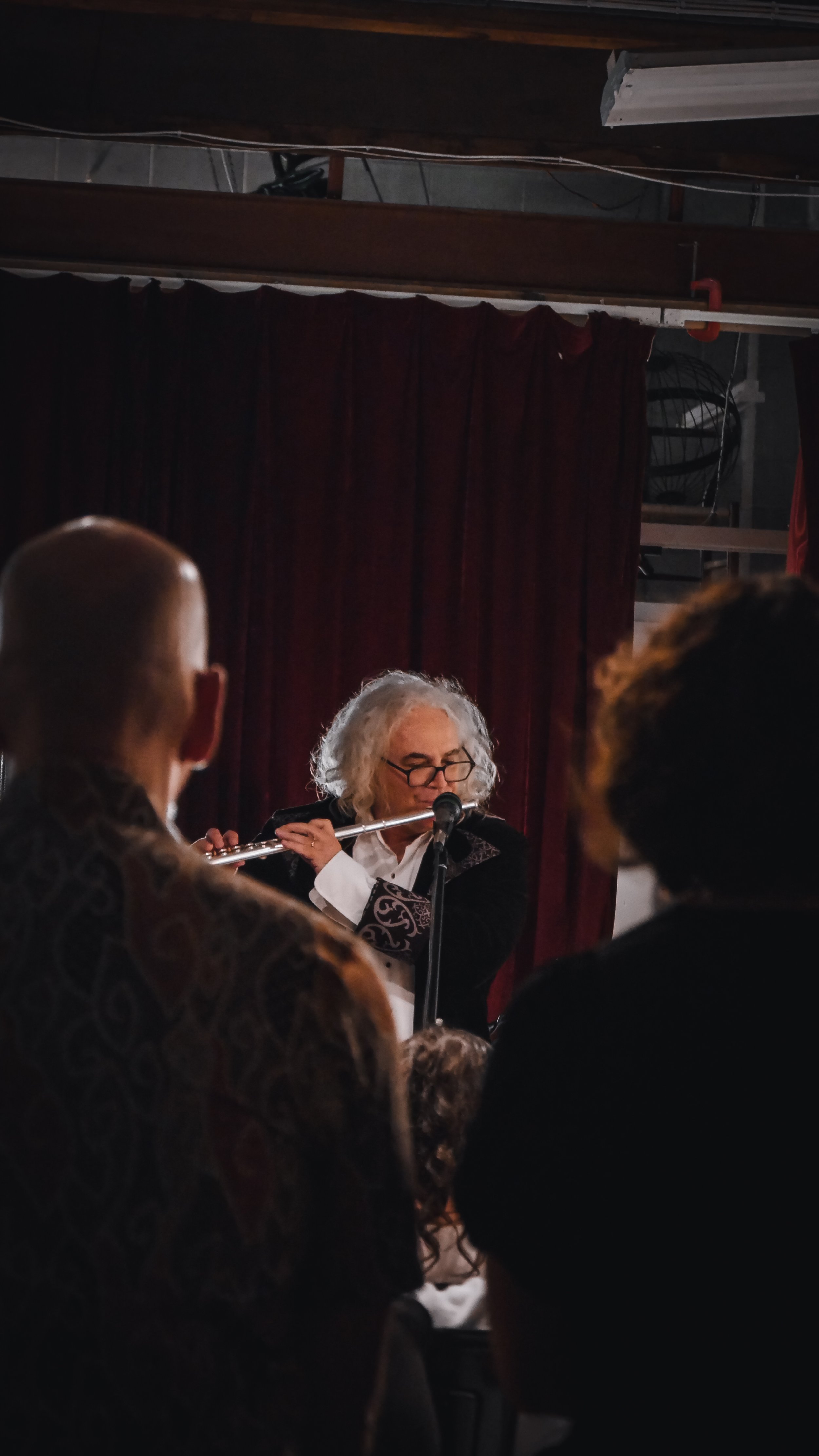 Bernard performing flute 1.jpg