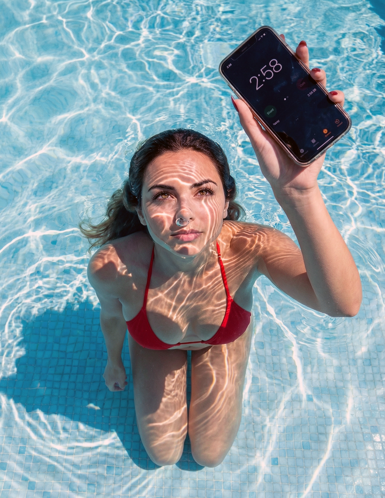 freepik__unique-drone-shot-of-img1-kneeling-underwater-hold__82882.png