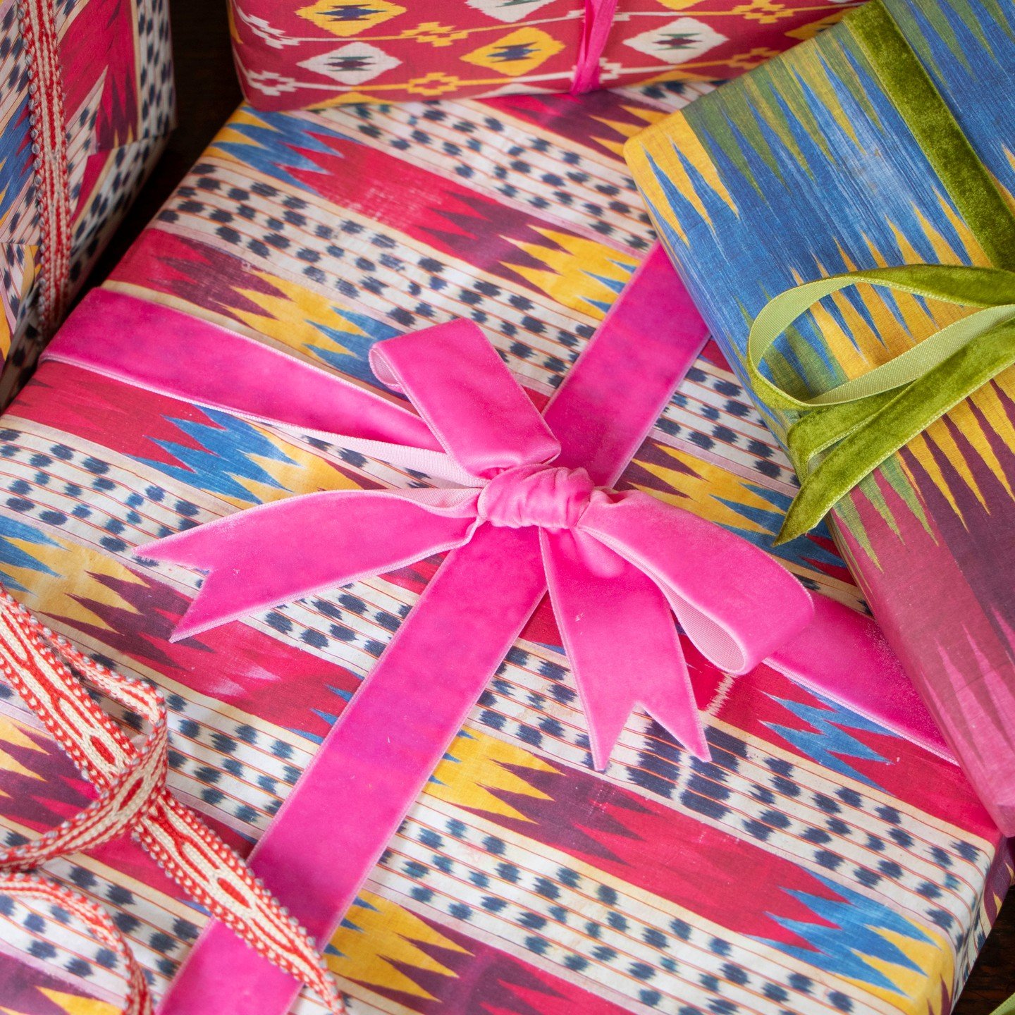New wrapping paper from Dacha &amp; Steppe based on nineteenth century ikat textiles from Central Asia. The art of abr bandi (cloud weaving) in which the warp yarns are resist dyed repeatedly before being set on the loom for weaving reached an artist