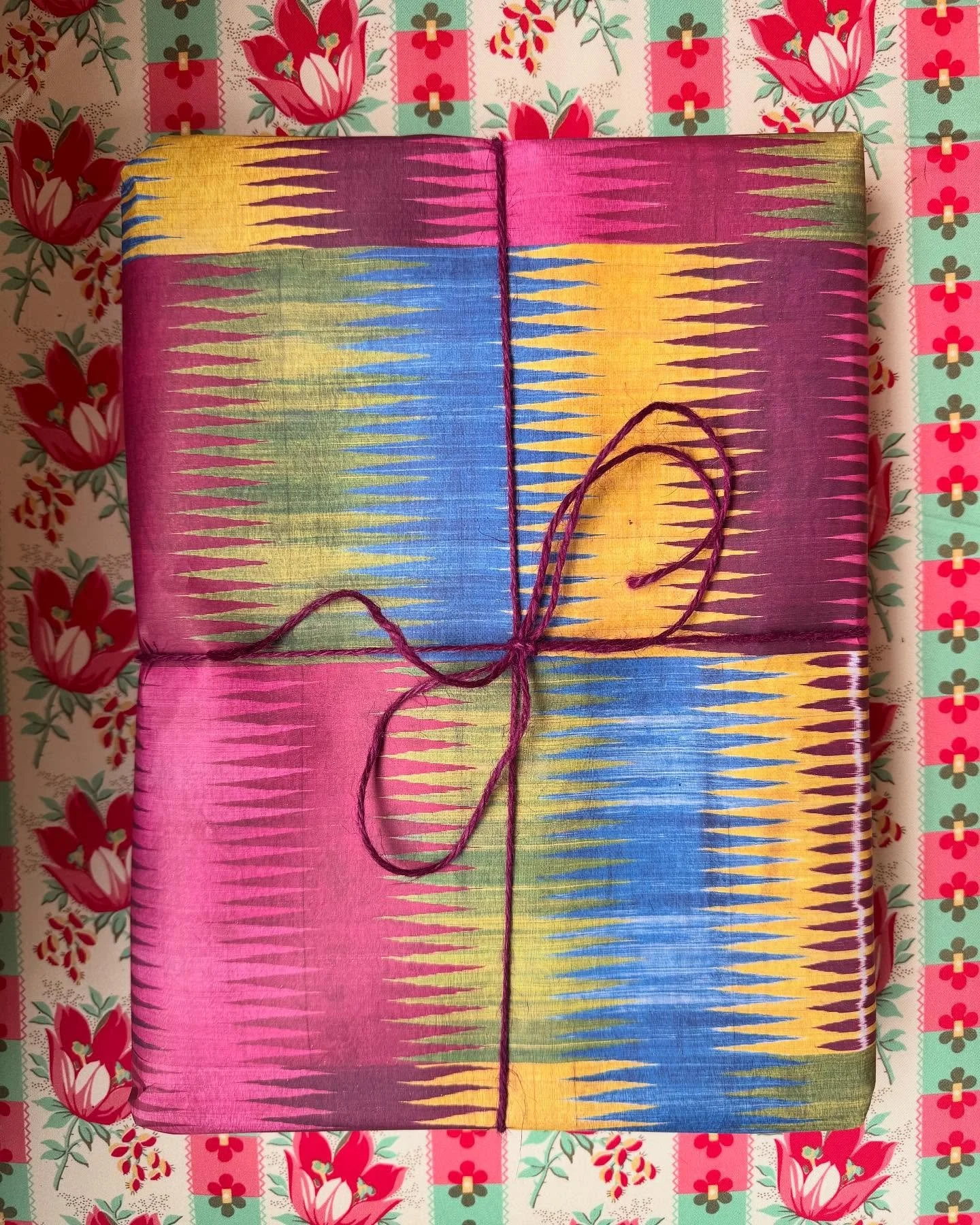 It&rsquo;s not really surprising that our beautiful wrapping paper based on a 19th century ikat textile from Bukhara goes so well with my @alexandratolstoy chair as the textile Alexandra used is a 19th century Russian roller-printed cotton lining fro