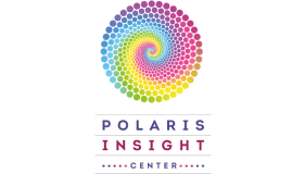 Colorful spiral galaxy inside a rainbow-colored swirl.