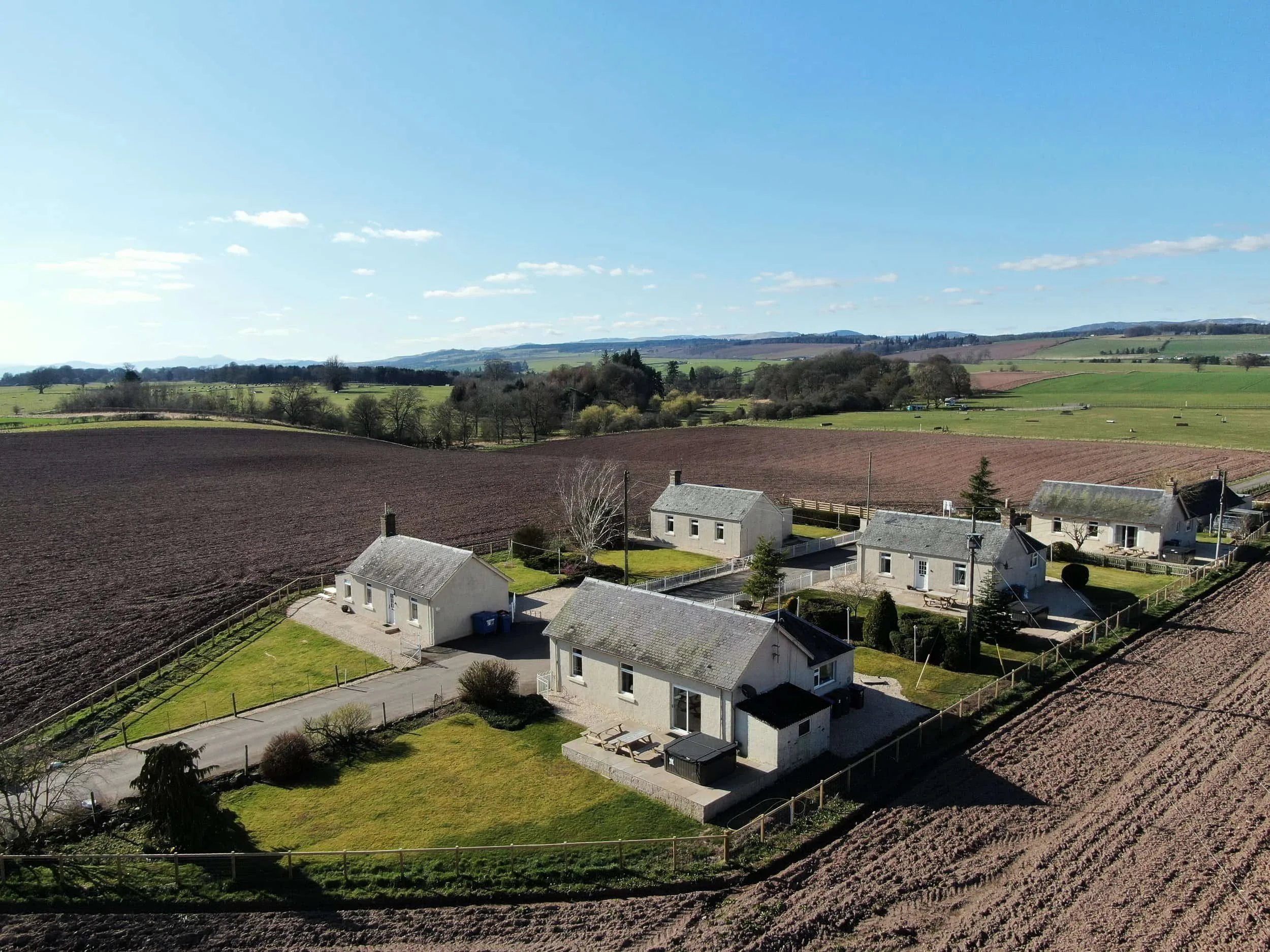 A hamlet of five self catering cottages, set in a sunny farm with fields surrounding them.