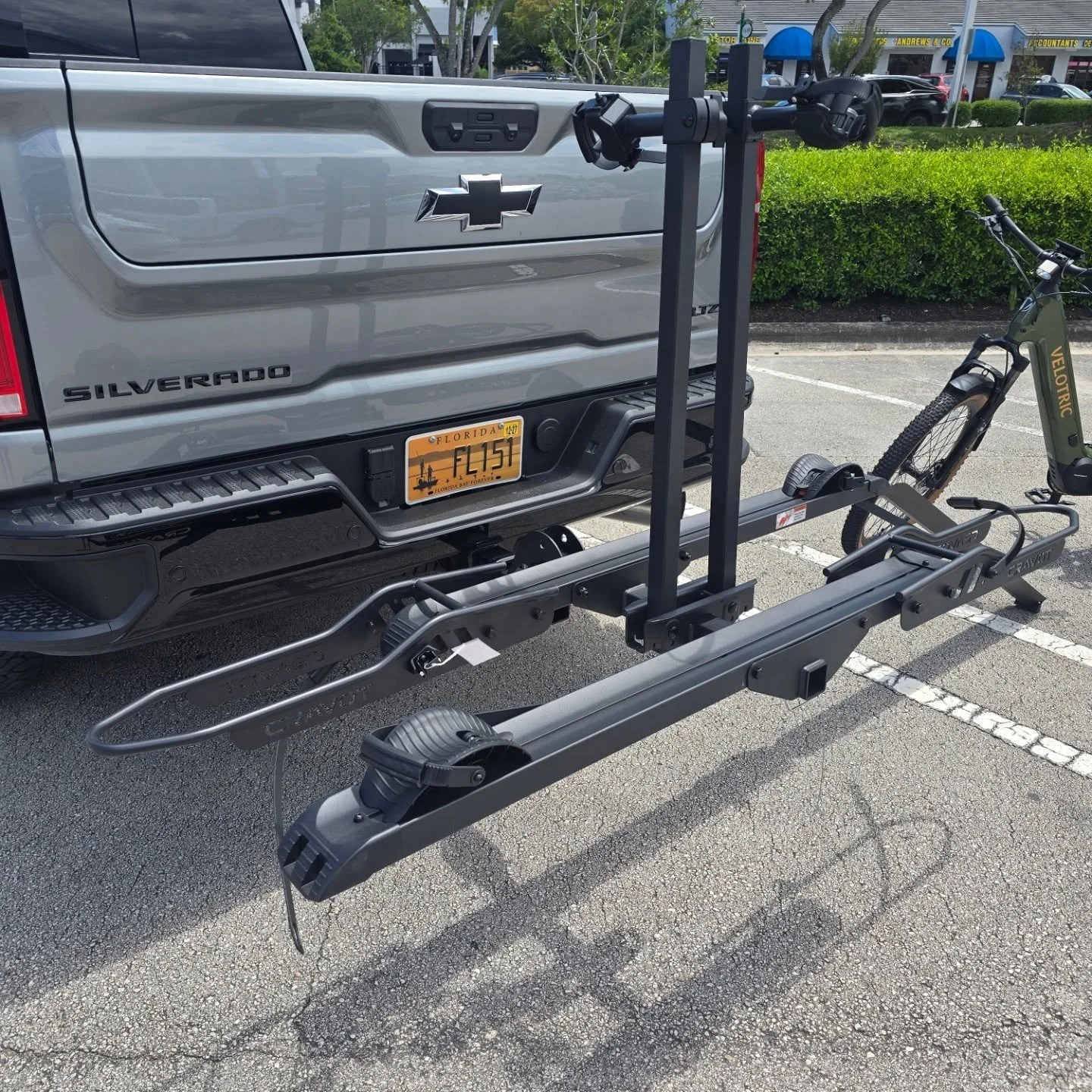 We are trying out the new Cravot Cyberrack S2 hitch bike rack for e-bikes. It's heavy duty and simple to assemble, holds 300lbs, has a built in ramp, and folds up to block your back up camera, just like any other rack. We have these for sale at the s