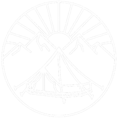 Outline of mountains behind a tent, with a circular border and radiating sun-rays over the alpine near Whistler BC.