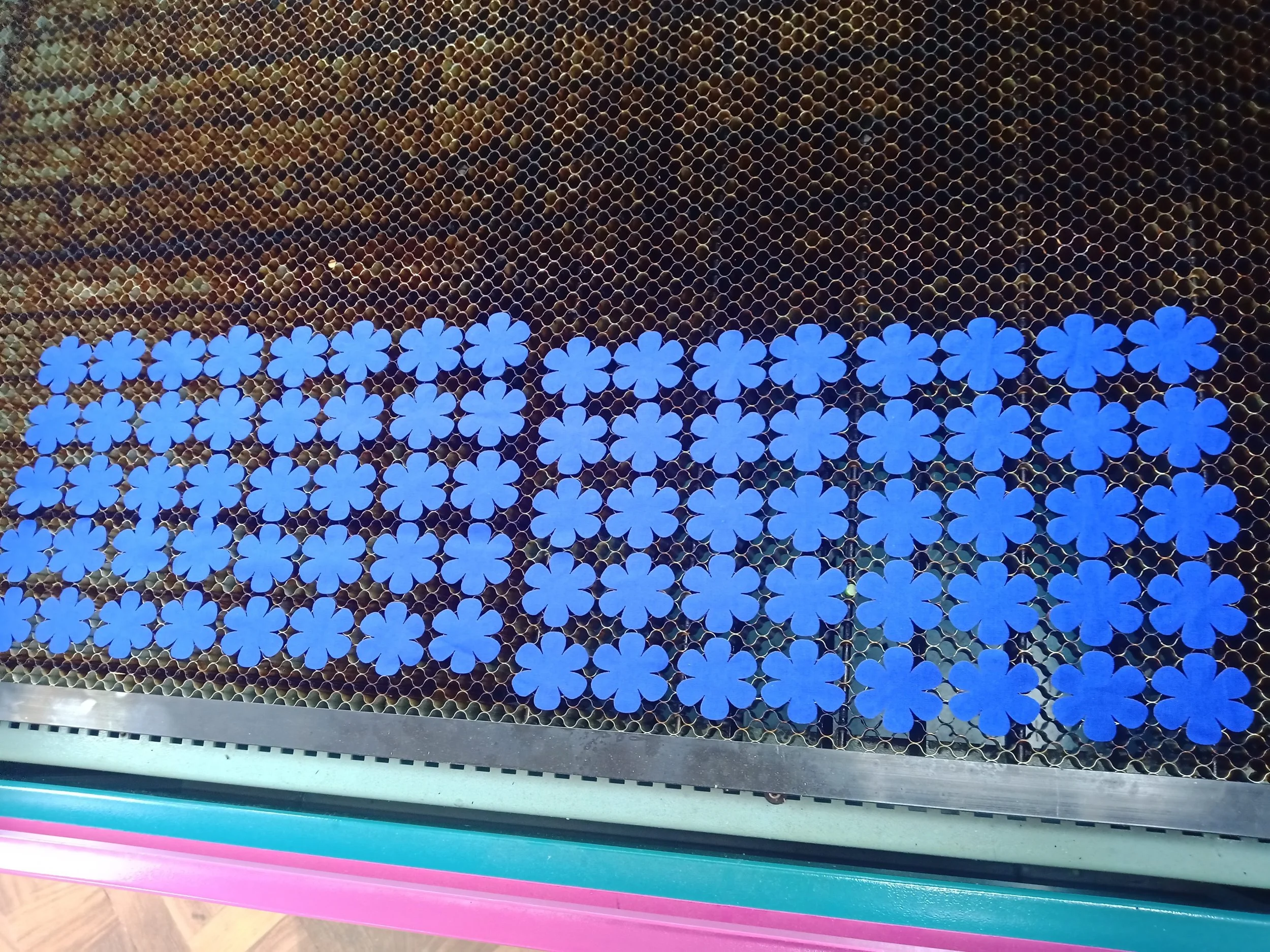 The process was also considerably faster than cutting by hand. The added advantage in that the heat helps to fix the edges of the cut, minimising the fraying while attaching the pieces.