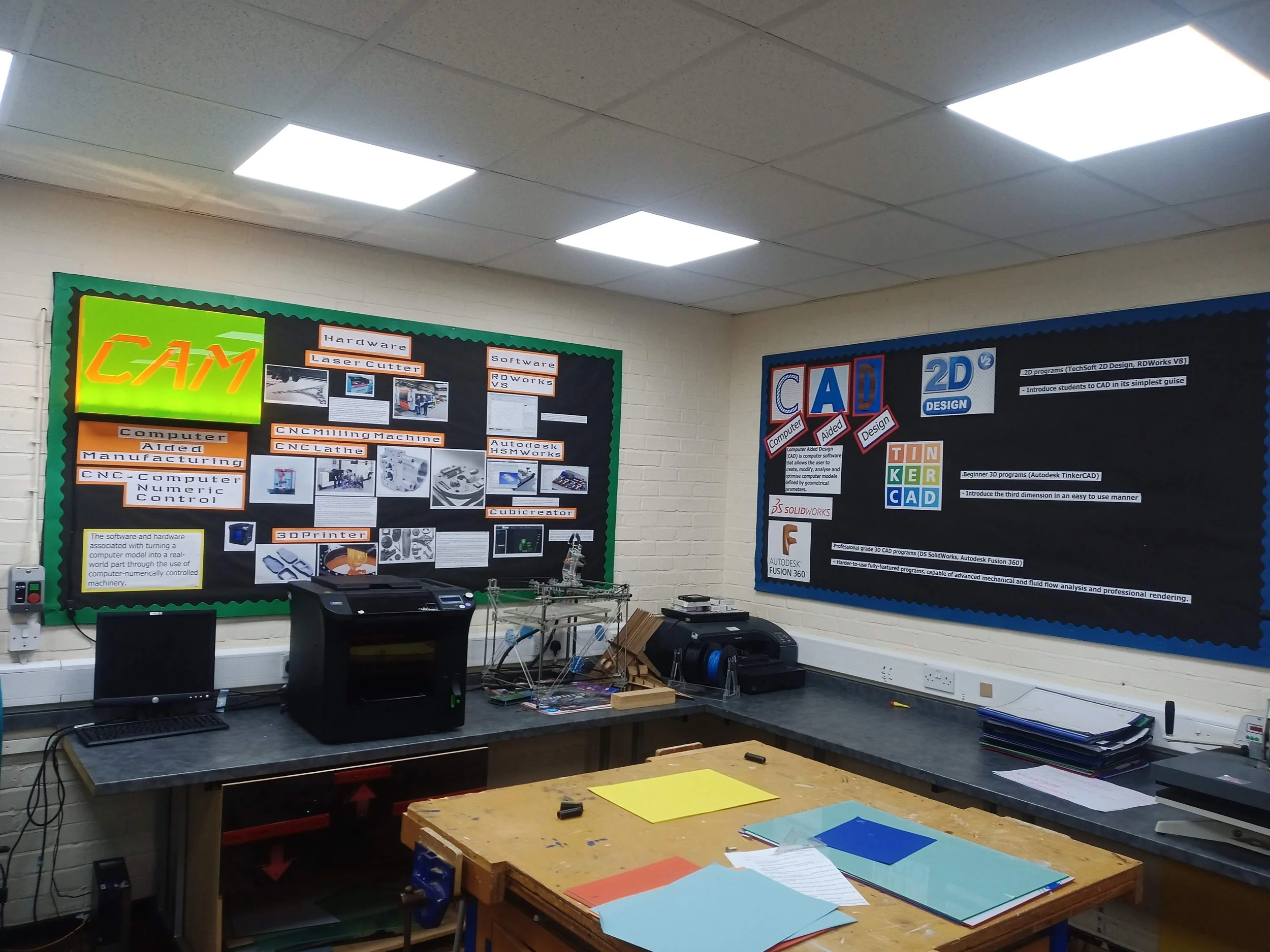 This corner used to be particularly dull with dated displays. We decided to turn the area into a CAD/CAM corner, with 3D printing and laser cutting, with a vinyl printer/cutter to be added later. I designed and produced these two display boards, show