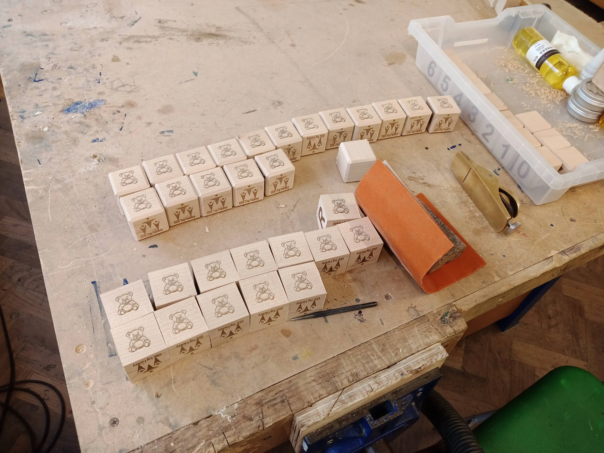 When my colleague had her first child, I made a set of beech stacking blocks, laser-engraved with the letters of the alphabet and numbers 0-9. Each block also had the school's logo and a teddy bear.