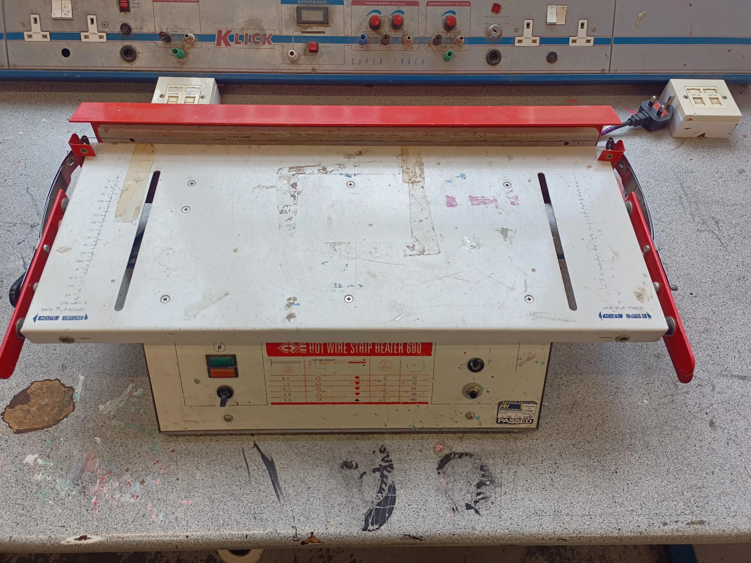 This hot wire strip heater was condemned at the annual machinery inspection due to the High/Low temperature toggle switch plastic actuator having been broken by a student. The recommendation by the external company that did the inspection was to repl