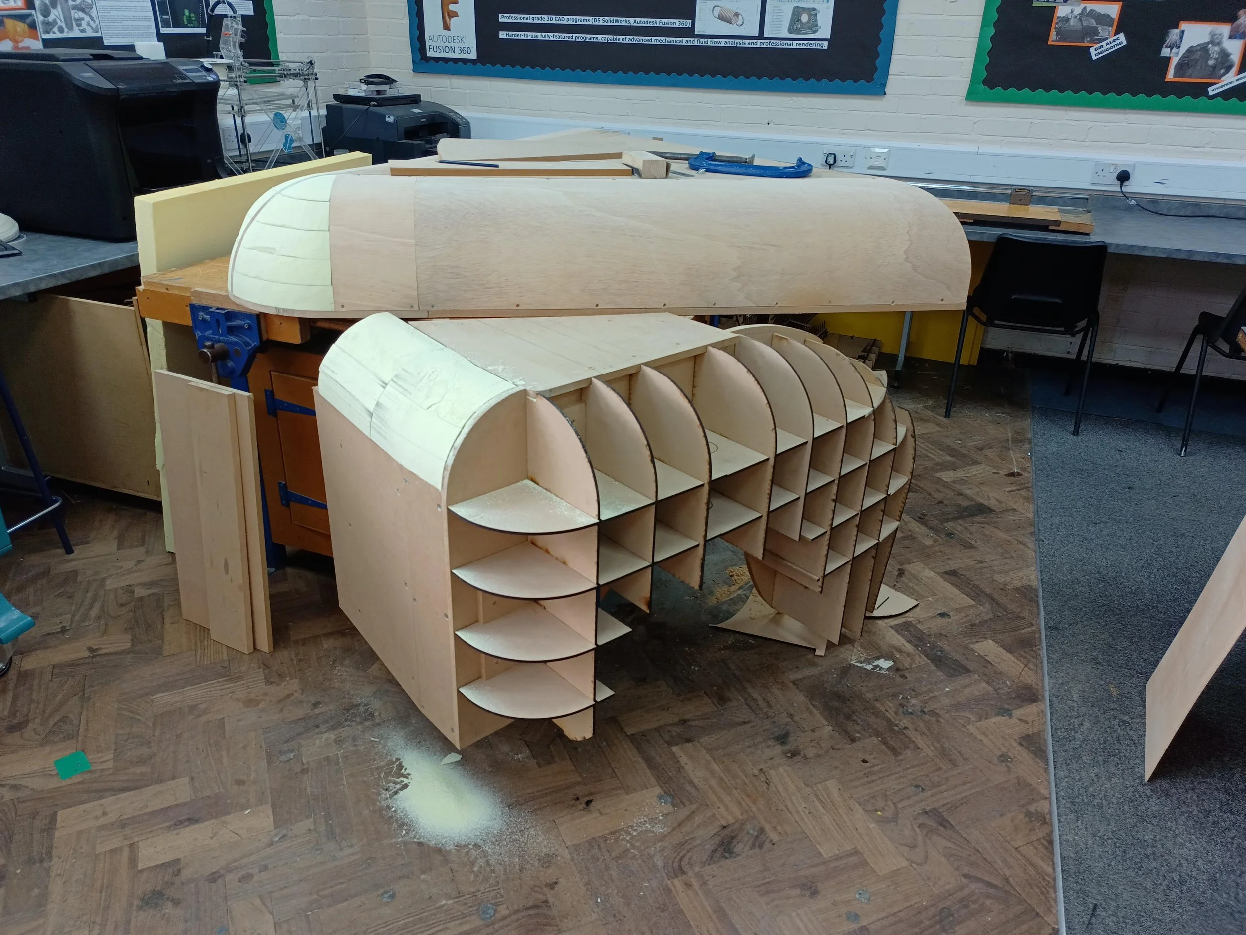 The wing plugs were formed in a similar fashion, this time using a laser-cut grid extracted directly from the Solidworks model.