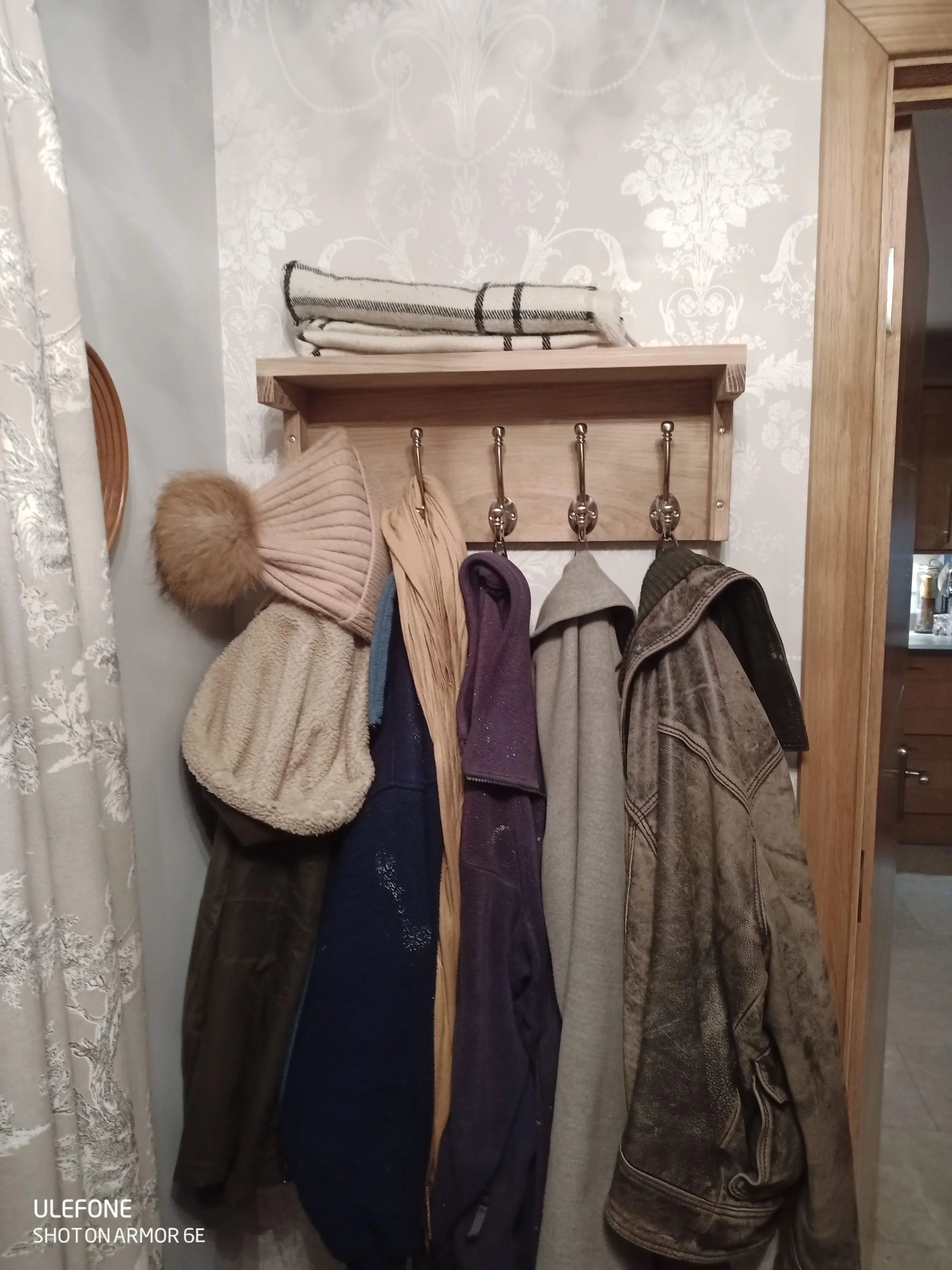 A coat hanger and entrance hall shelf, built from oak for my mother.