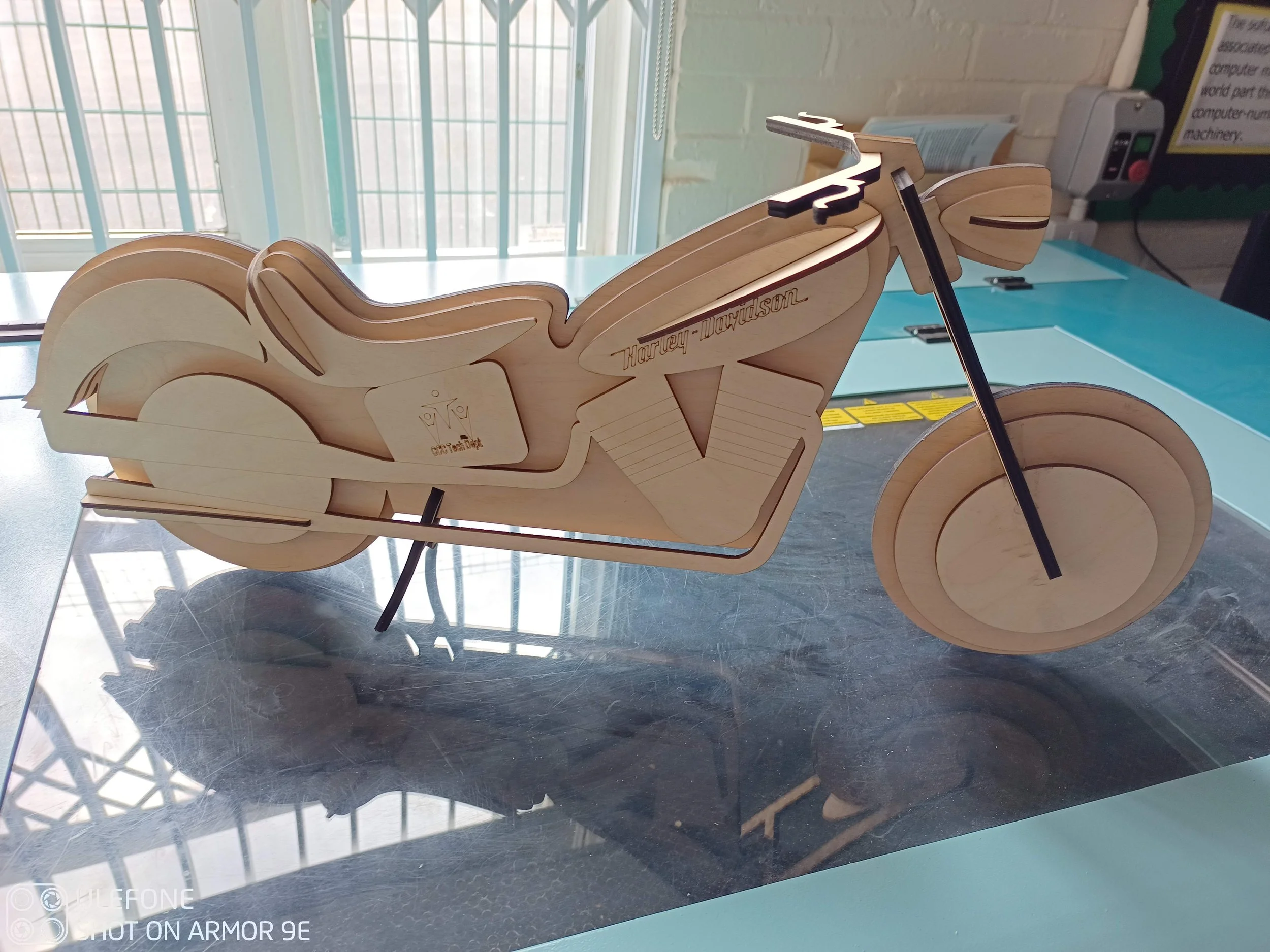 A series of interlocking components in orthogonal planes led to a design that self supported without the use of glue.