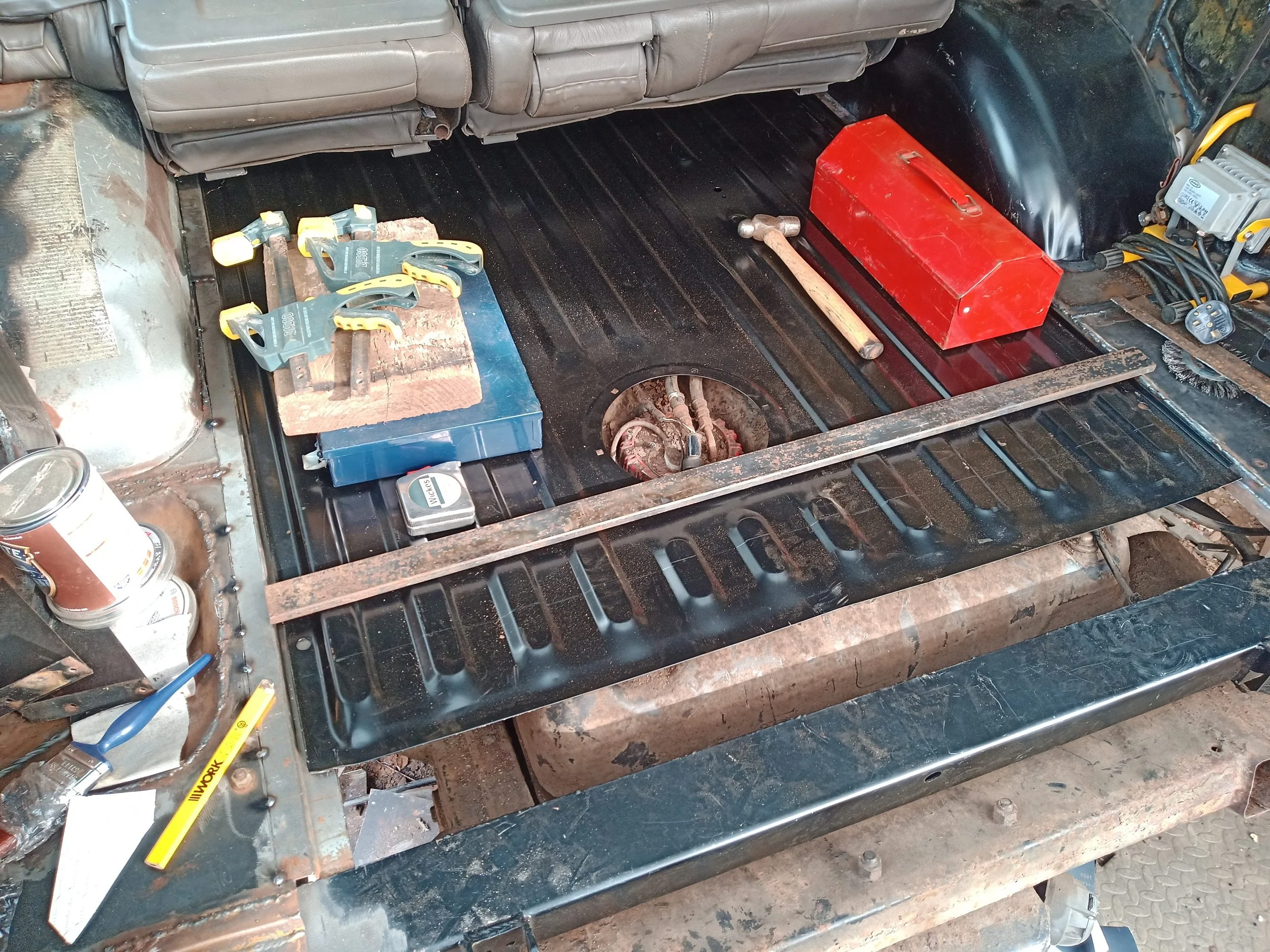 The new floor panel was just a tad too short...