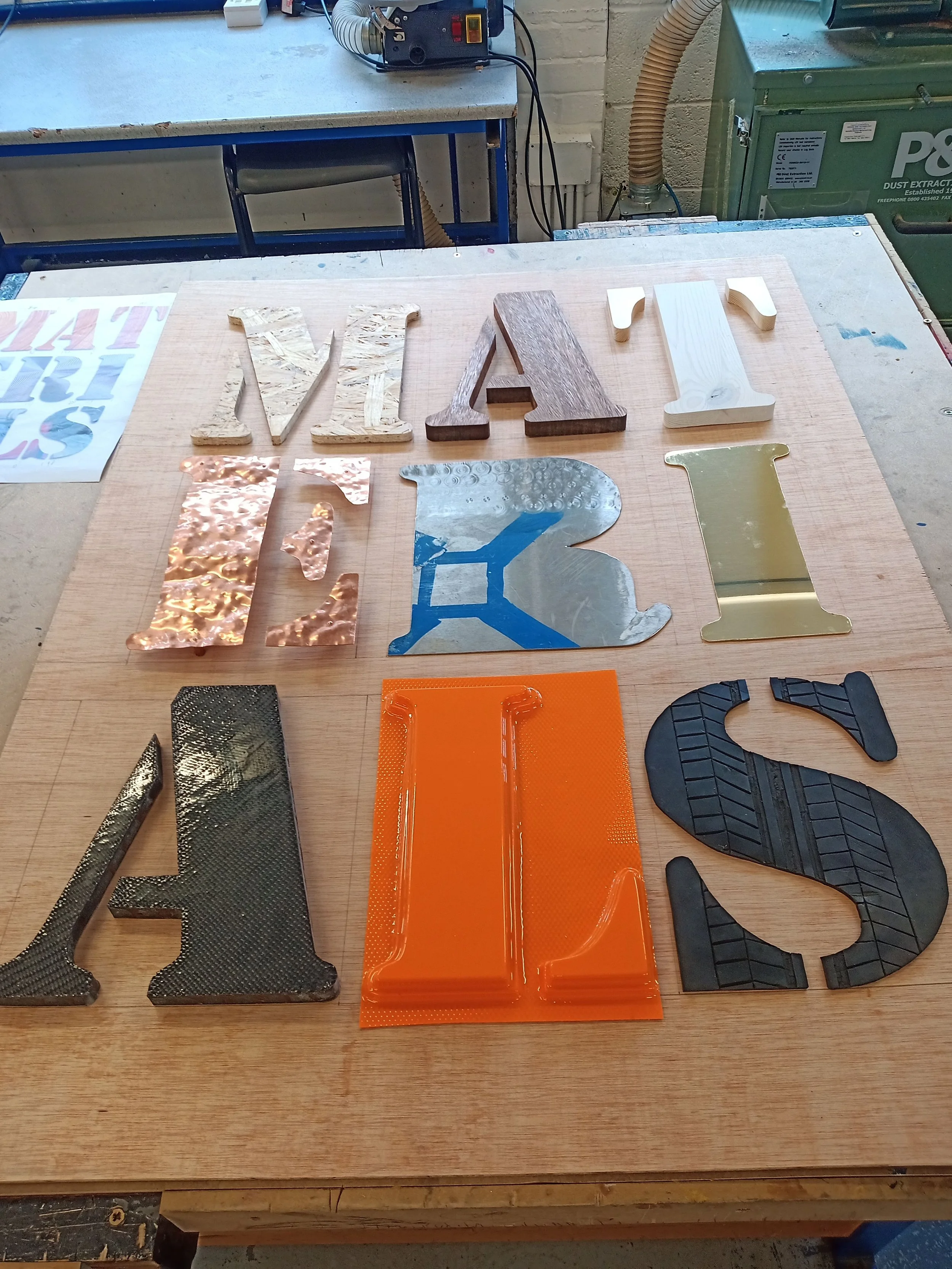 The top three letters represent Wood: manufactured boards represented by oriented strand board (OSB), hardwoods, represented with Walnut and softwood, represented by pine.