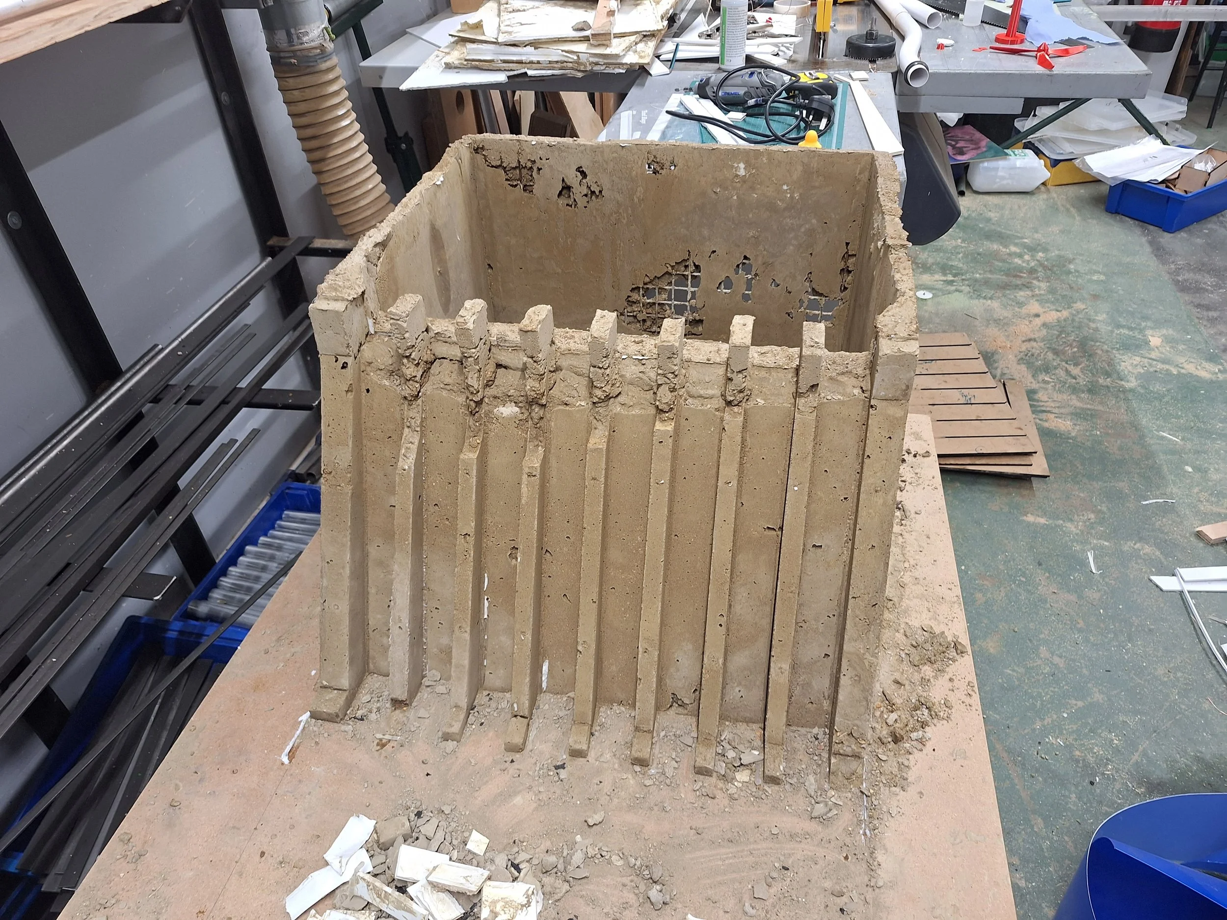 The casting, as removed from the mould. Not perfect. With hindsight, a mix with just sharp sand would have worked better and a slightly looser mix. Unavoidable was the scorching summer weekend that I poured this on, which did not give me as much work