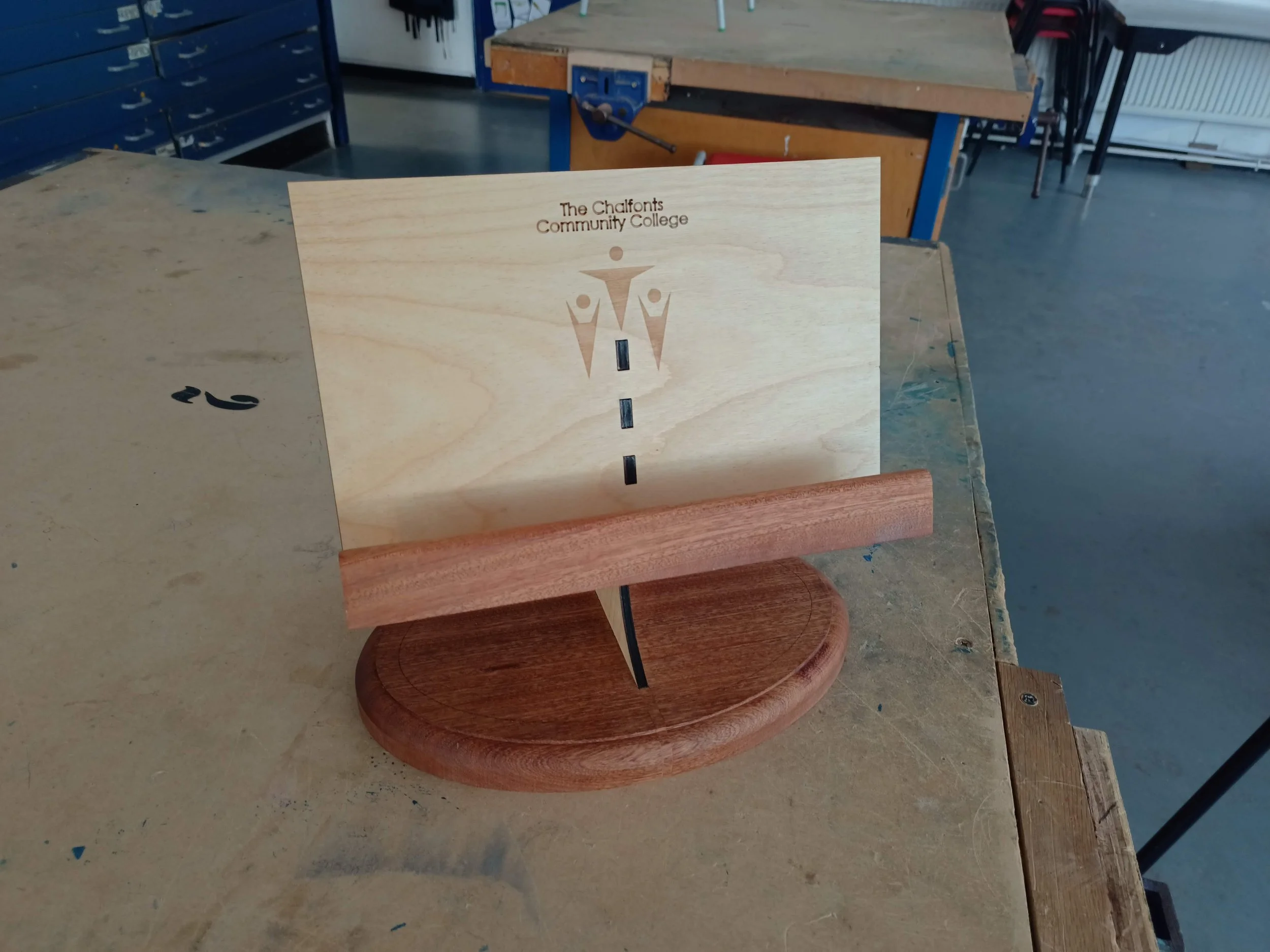 A recipe stand designed and manufactured for gifts for some visiting speakers to the Food Technology department. With the school's name and logo engraved in the front, this will be a reminder of their visit every time they cook.