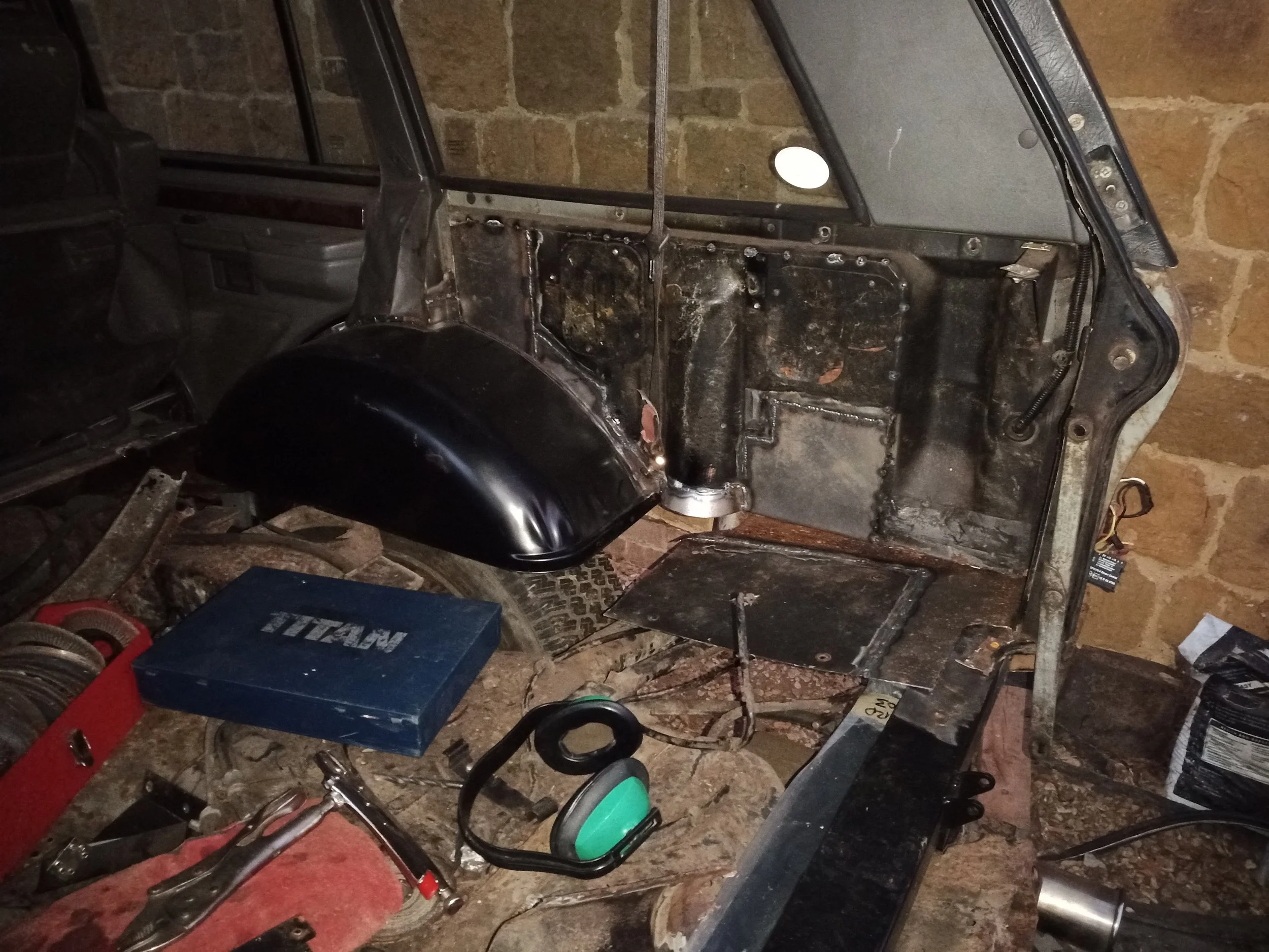 This inner wheel arch was too far gone to save. Several repairs to the inner wing were also required.