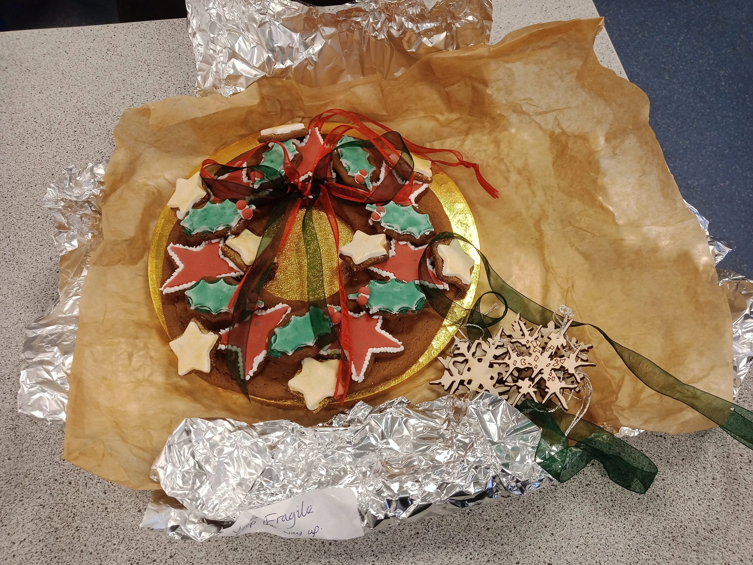 Laser cut birch ply snowflakes helped to decorate the wrapping.