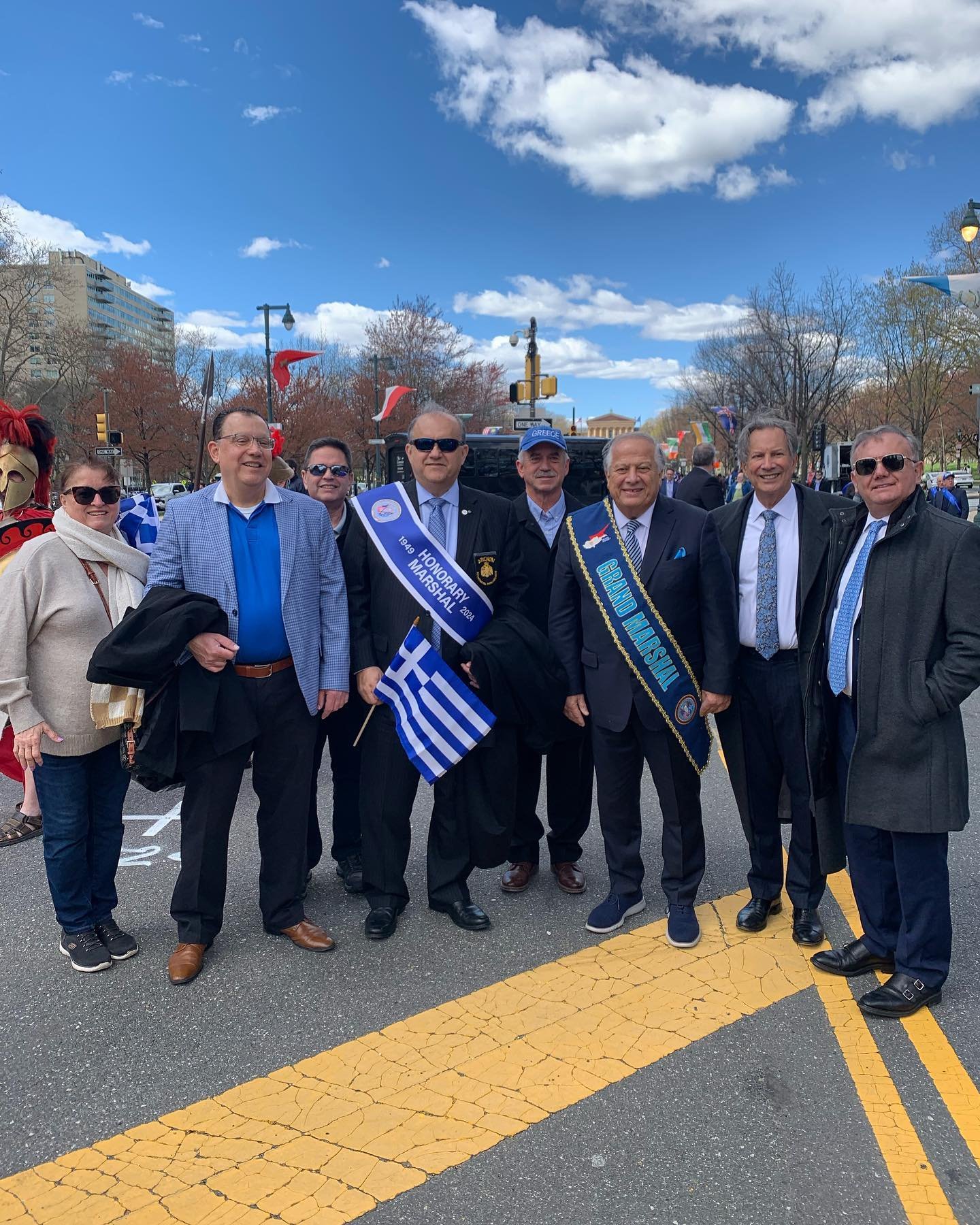  Grand Marshal Philip Christopher, AHI Board Members, and other parade attendees. 