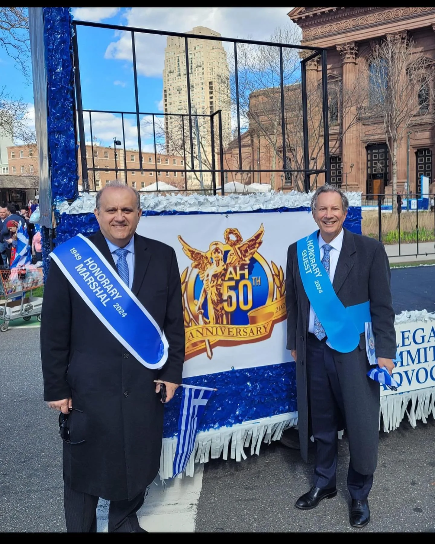  (L-R) AHI President Larigakis and AHIF President Leon Andris in front of AHI’s float in Philadelphia. 