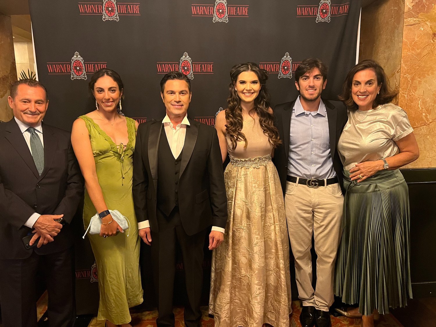  The Sakellaris Family poses with Mario Frangoulis and Theresa Carlomagno. 