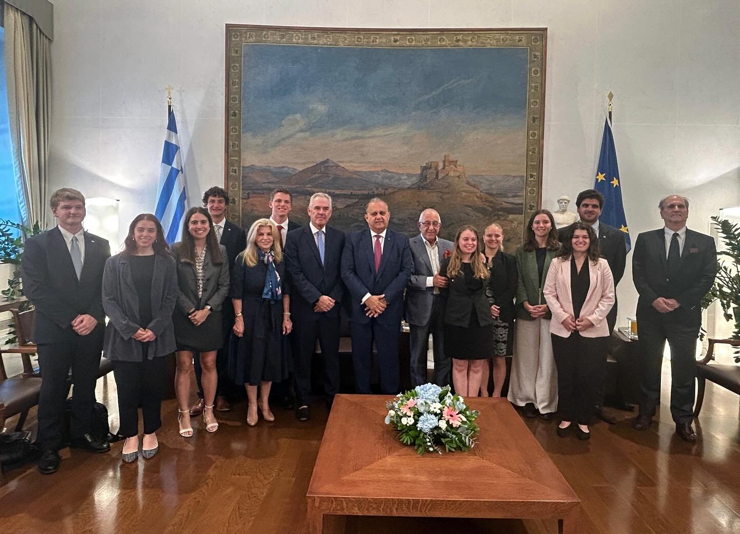 President of the Hellenic Parliament Nikitas Kaklamanis (center) with AHI President Nick Larigakis, AHI Athens Chapter President Vice Admiral Vasileios Kyriazis (ret.) H.N. (to his right) and Maria Wills, AHI Board Member (to his right) and the stu