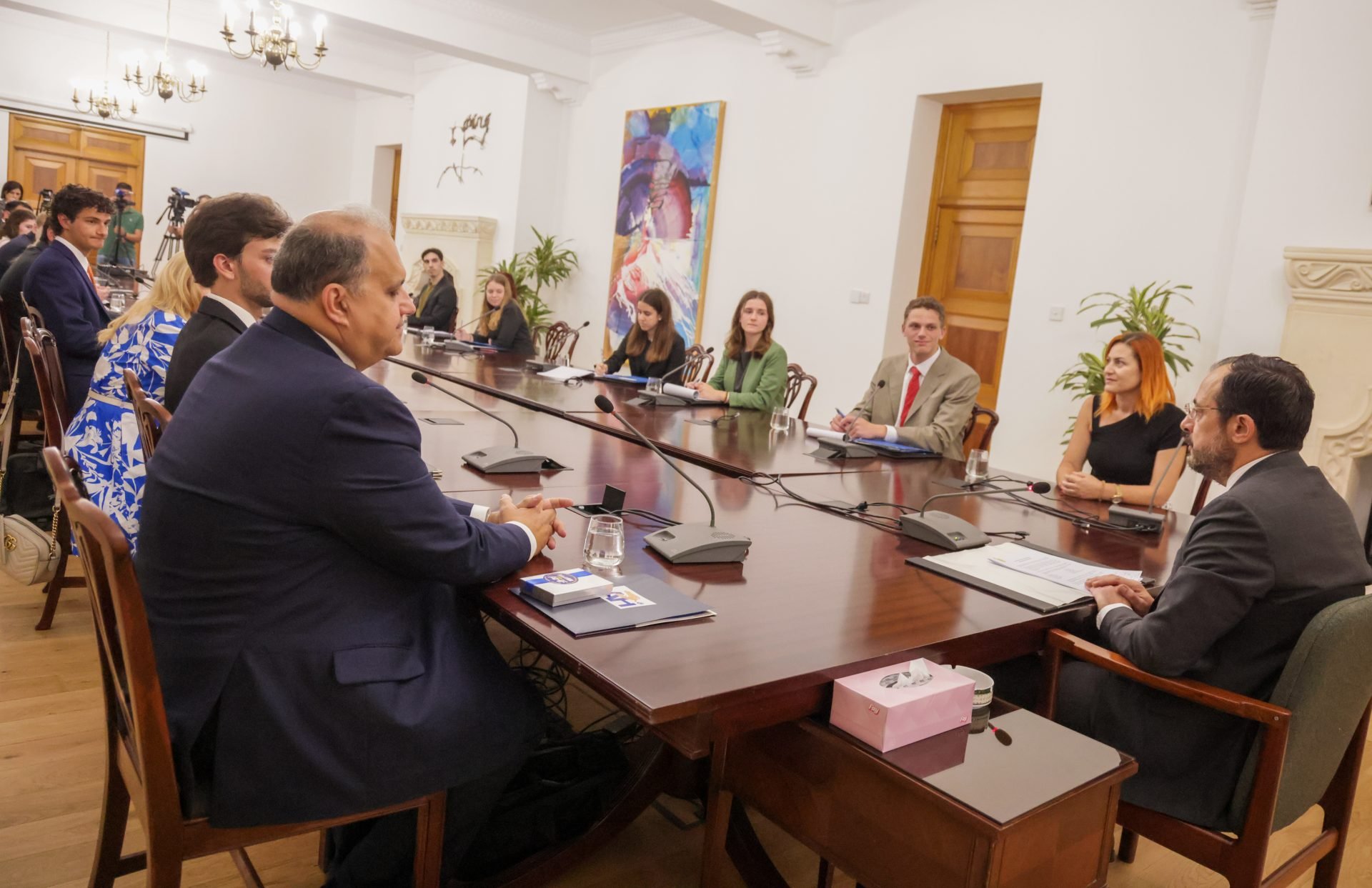 President of the Republic of Cyprus, Nikos Christodoulides (r) briefing the students at the Presidential Palace.
