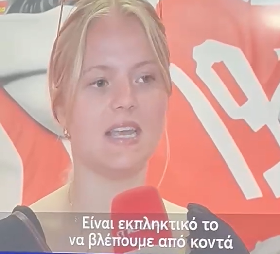 Isabella Marks being interviewed on MEGA TV at the Karaiskakis Stadium, home of Olympiacos F.C.