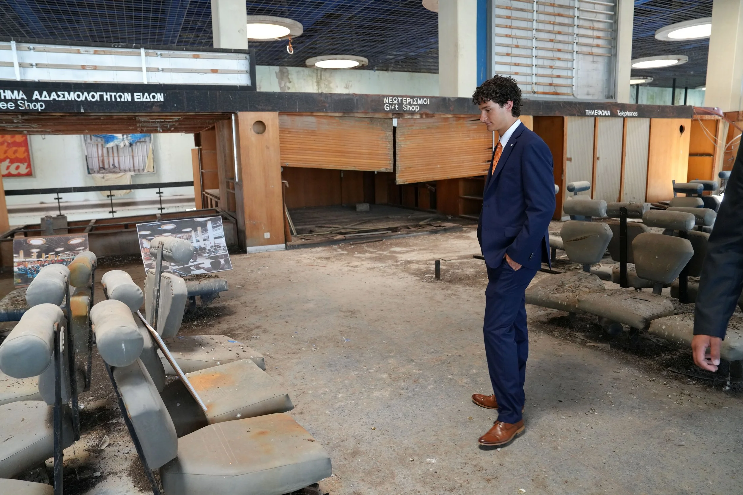  Student observes lounge in the abandoned Nicosia International Airport. 