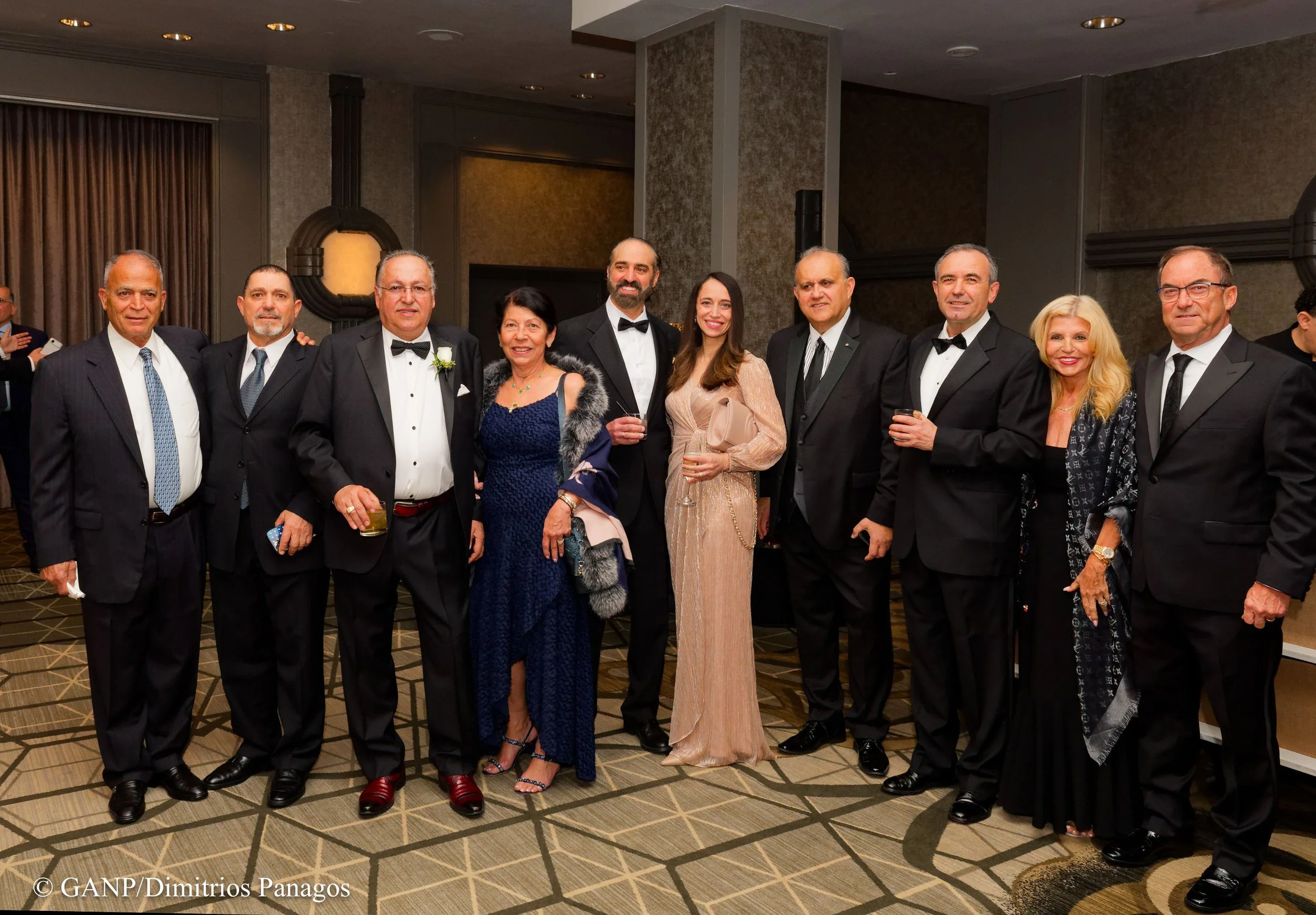 Savas and Maria Tsivicos with their family and guests and Maria and Don Wills