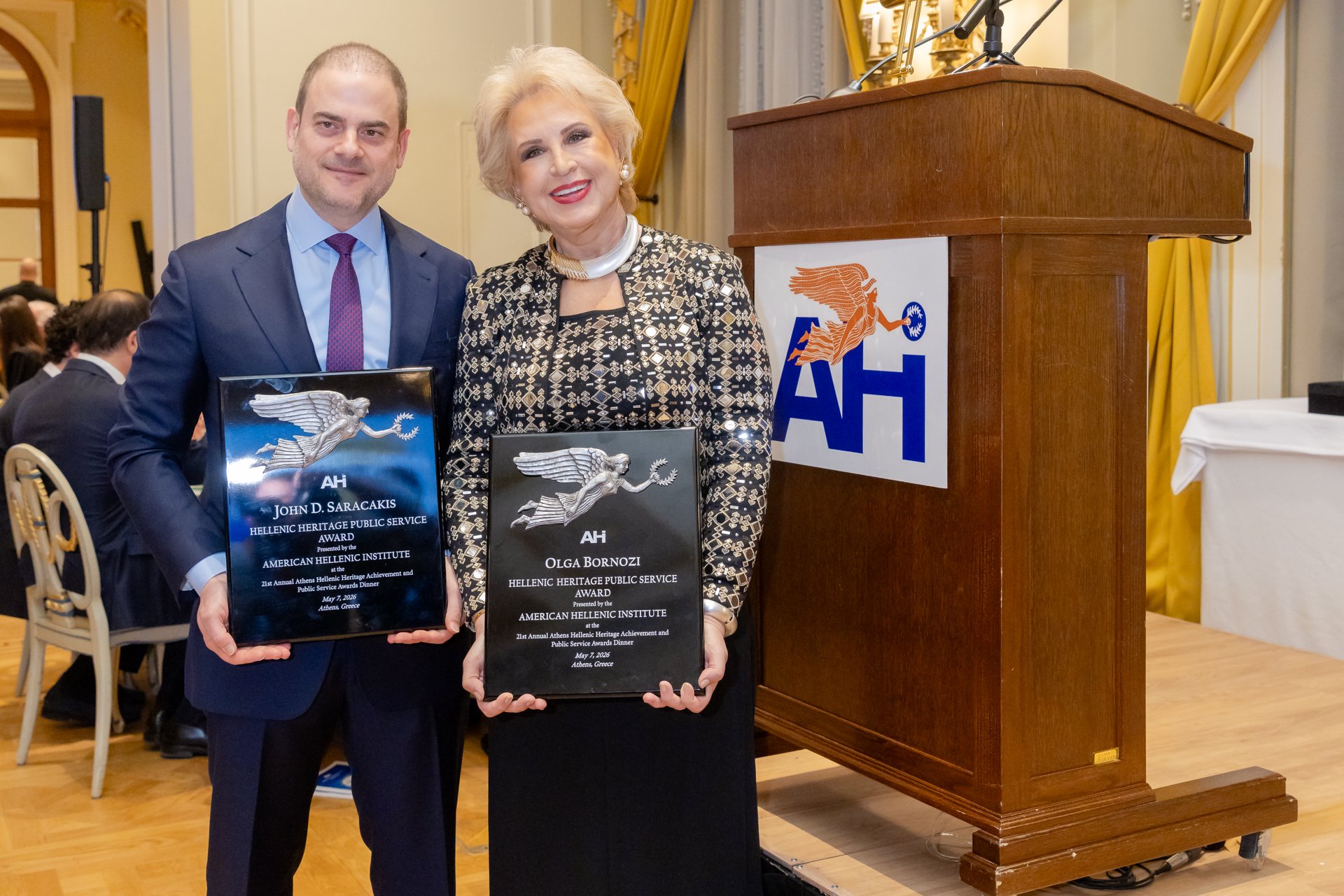 AHI Athens Dinner honorees Olga Bornozi and John Saracakis with their awards at the 21st Annual AHI Athens Awards Dinner 