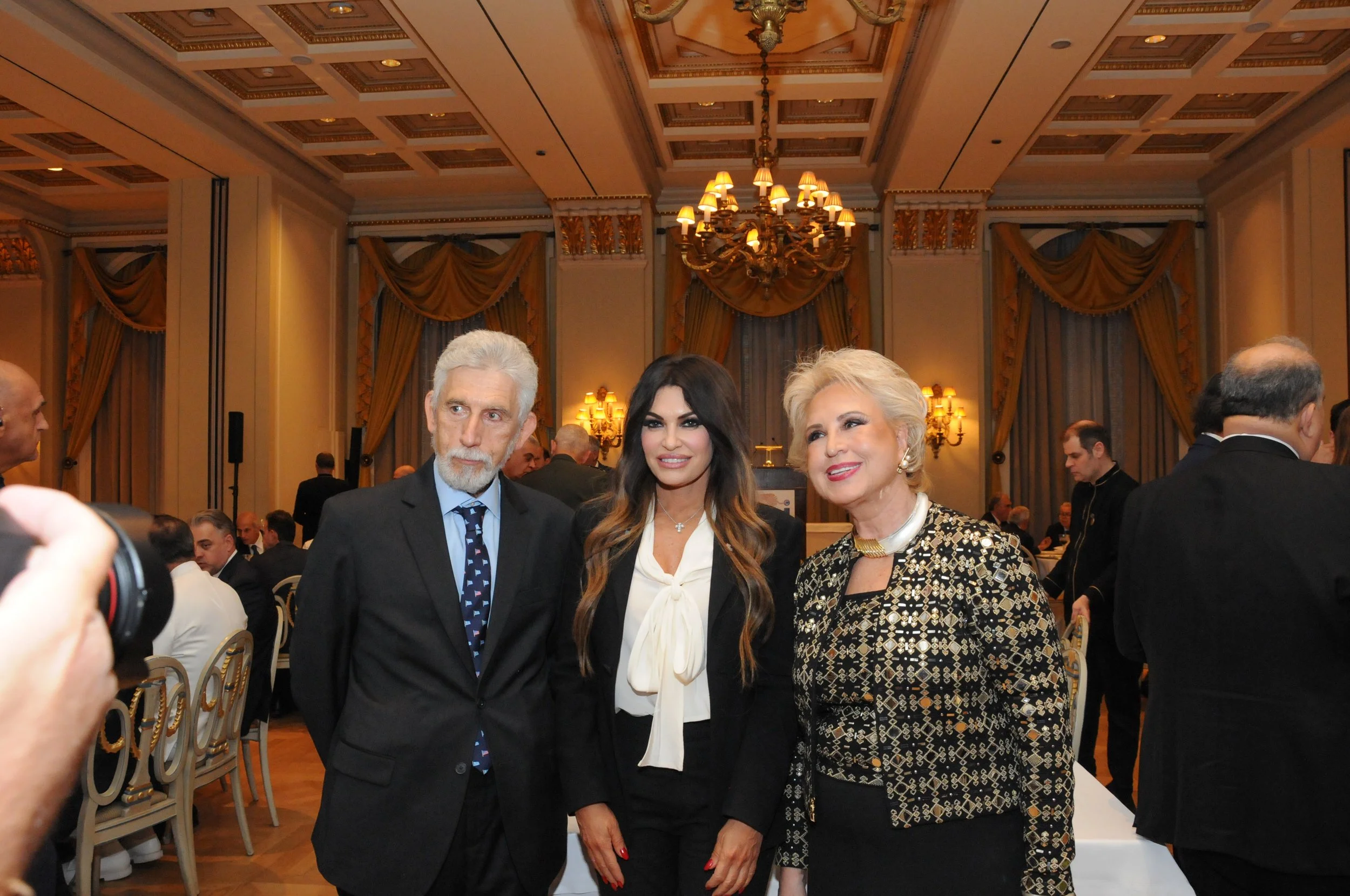  U.S. Ambassador to Greece Kimberly Guilfoyle with AHI Athens Dinner honoree Olga Bornozi and her brother, Nicolas Bornozi