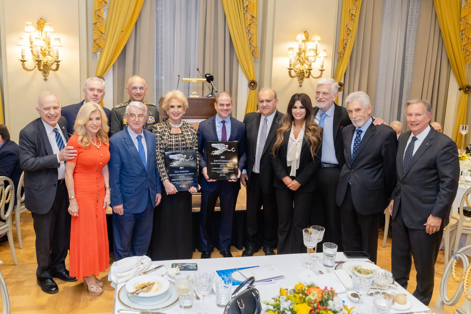 (L-R) Wills, VP of the Greek Parliament Athanasios Bouras, Bornozi, Saracakis, Larigakis, Amb. Guilfoyle, Loverdos, Bornozi, Andris. Behind: Lagos, Kyriazi, Gen. Choupis
