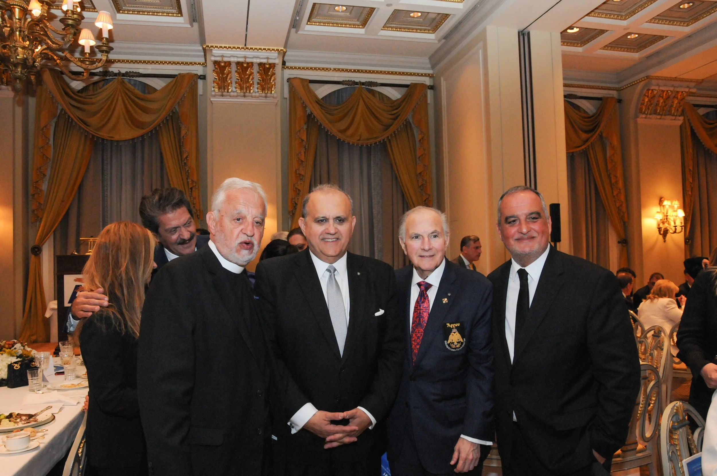 From left to right: Fr. Alex Karloutsos; AHI President Mr. Larigakis; Dr. Anthony Limberakis, National Commander of the Archons in America; and Archon Michael Karloutsos