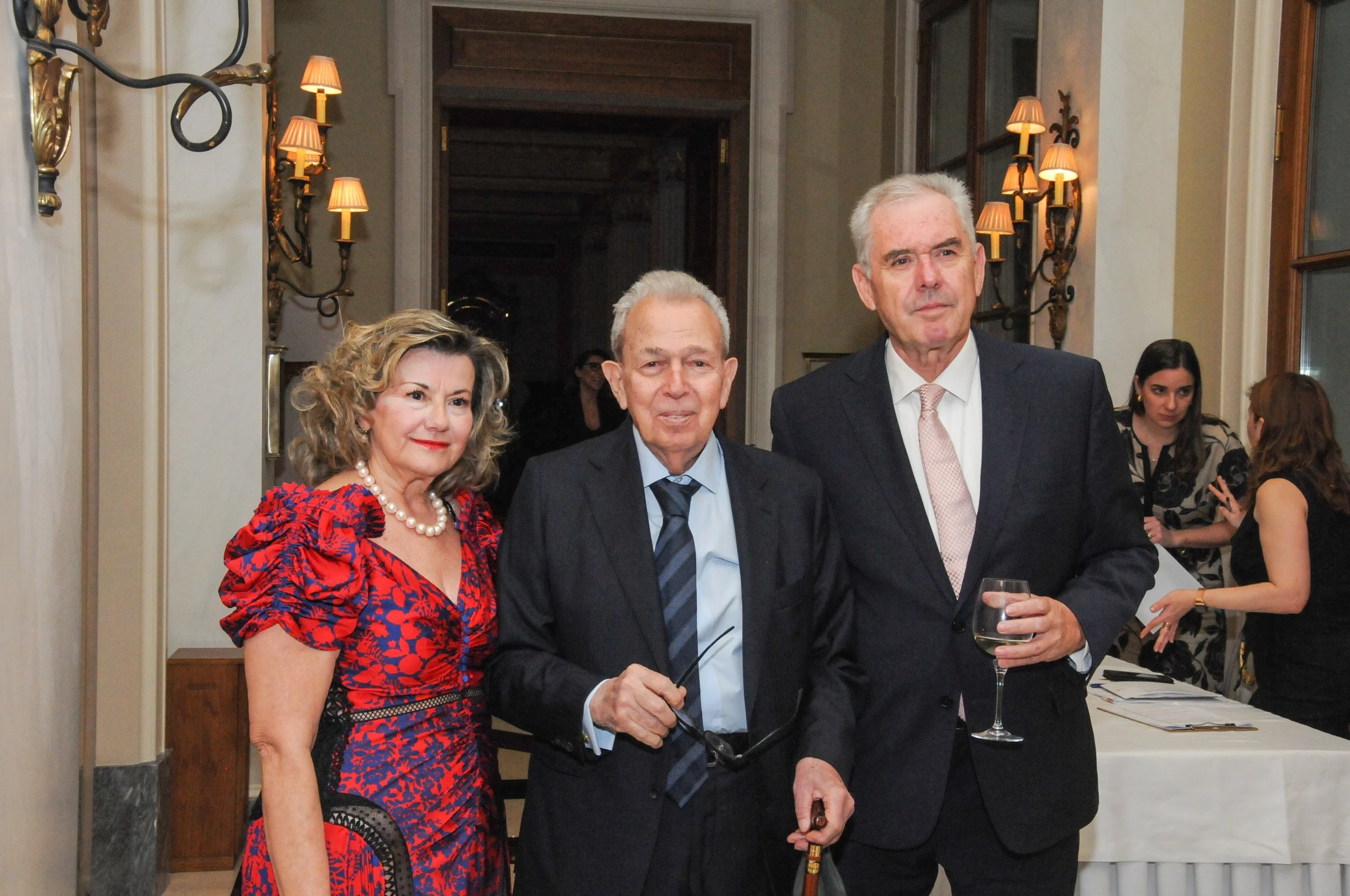 Past AHI-Athens Chapter President George C. Economou with AHI-Athens Chapter President Vasileios Kyriazi and his wife, Konstantina