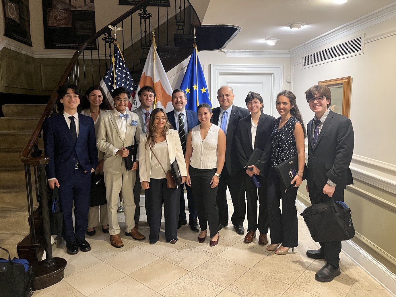 Ambassador of the Republic of Cyprus to the United States, Evangelos Savva (center), with AHI President Nick Larigakis and the students at the Embassy of the Republic of Cyprus