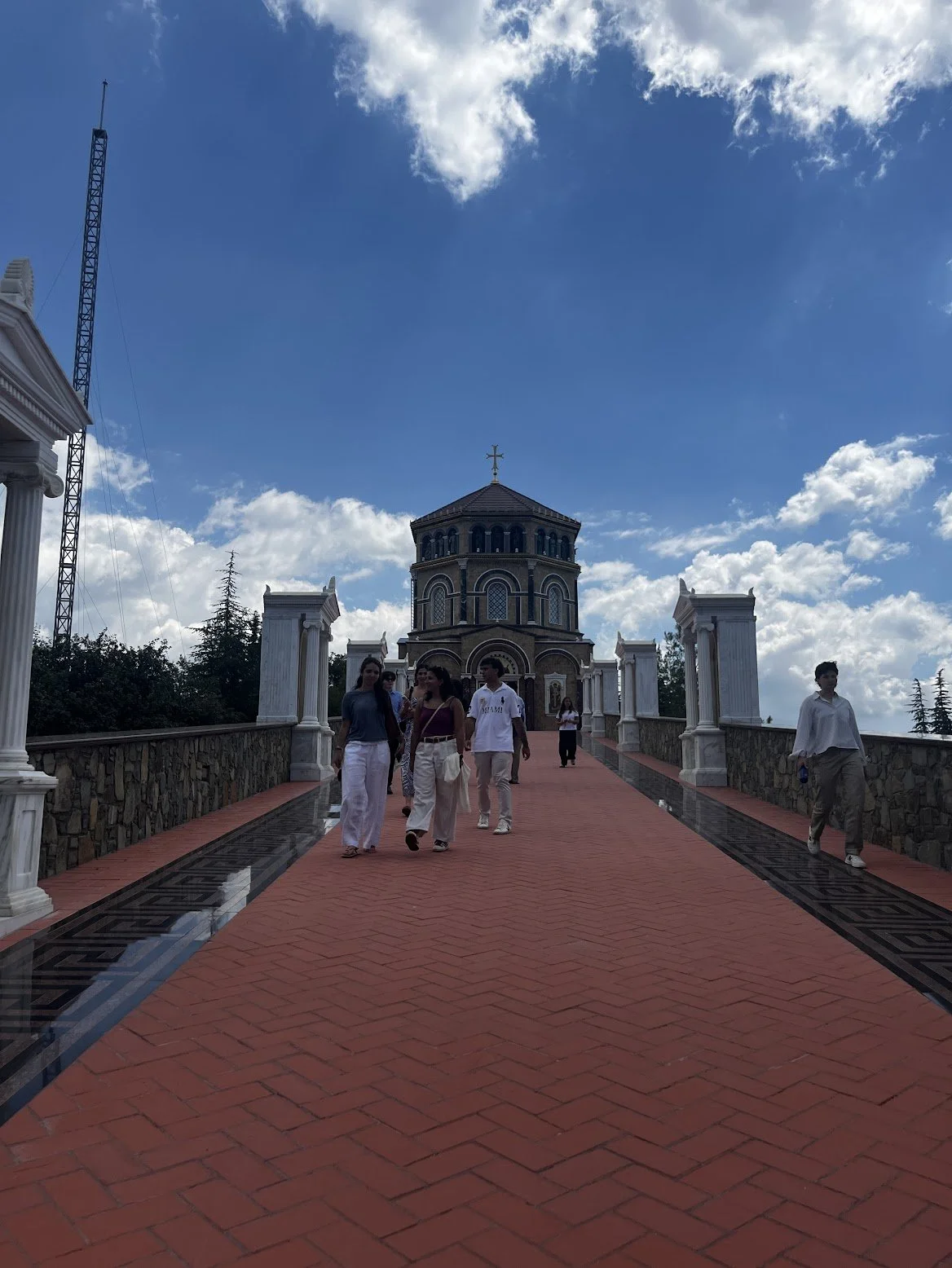  The students at Throni Church and the Tomb of Archbishop Makarios III on Throni Hill. 