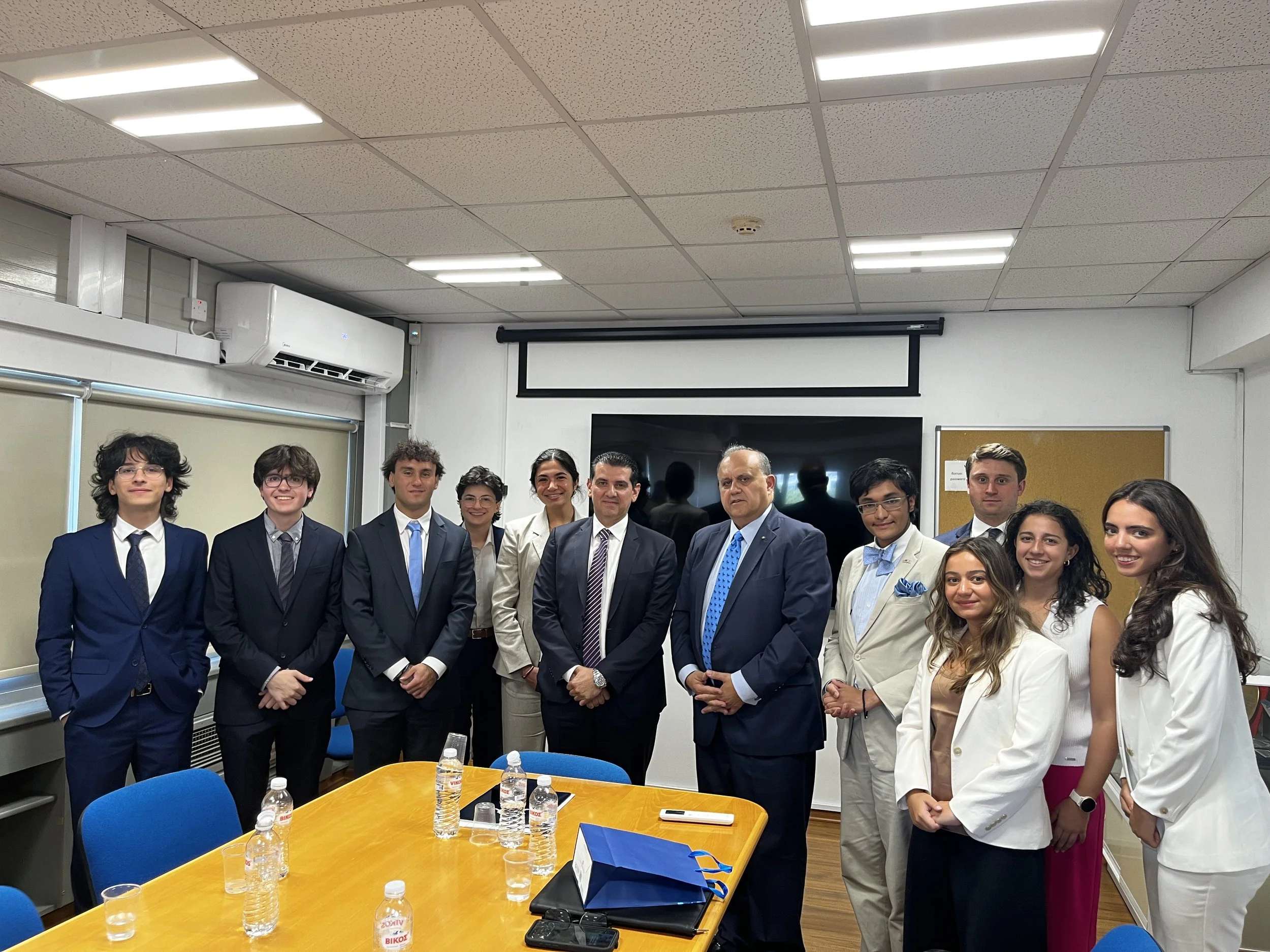  Mr. Michael Damianos, Minister of Energy, Commerce, &amp; Industry, with the group. 