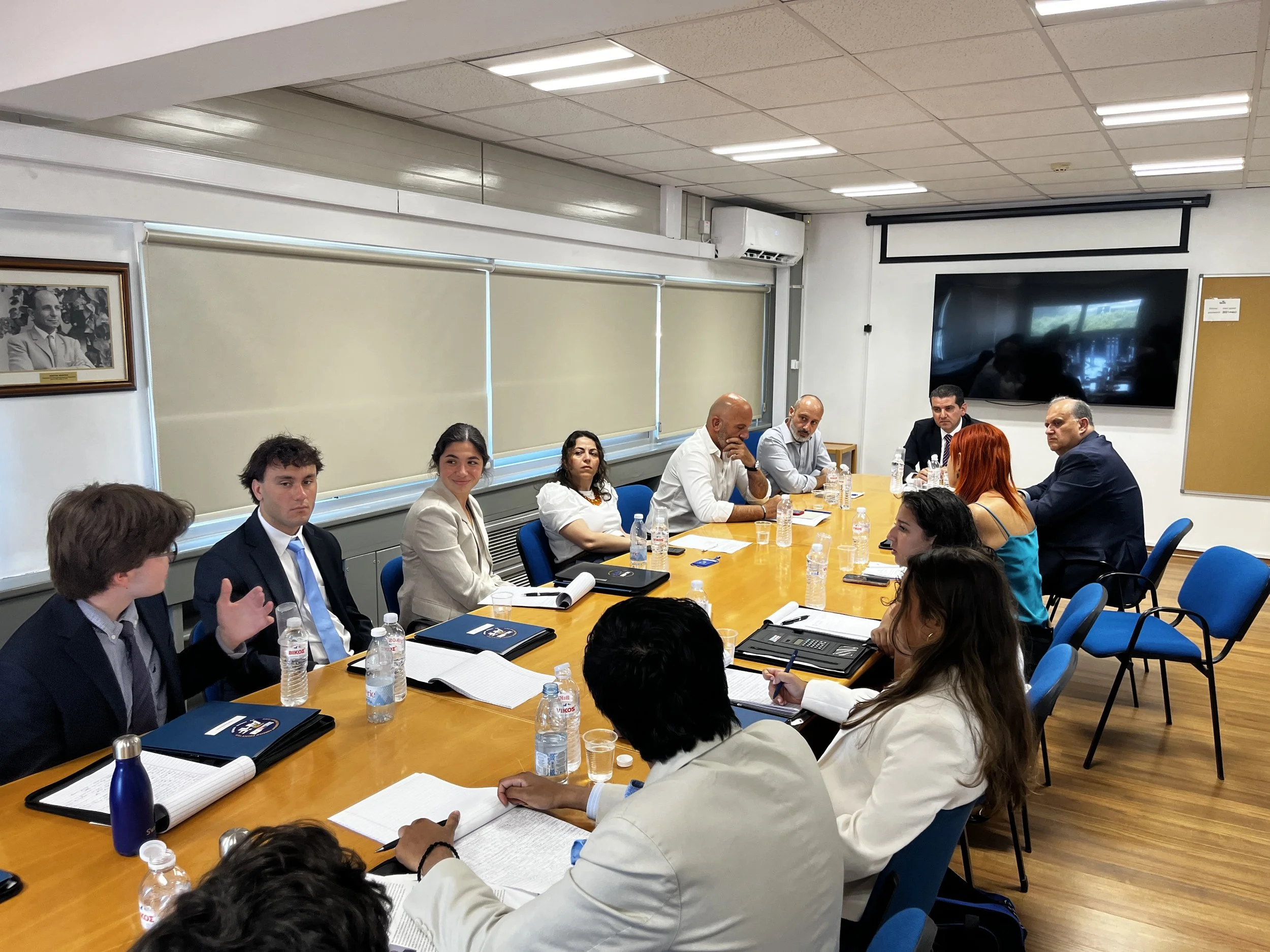  Students discuss Cyprus’s growing energy sector with Mr. Michael Damianos, Minister of Energy, Commerce &amp; Industry. 