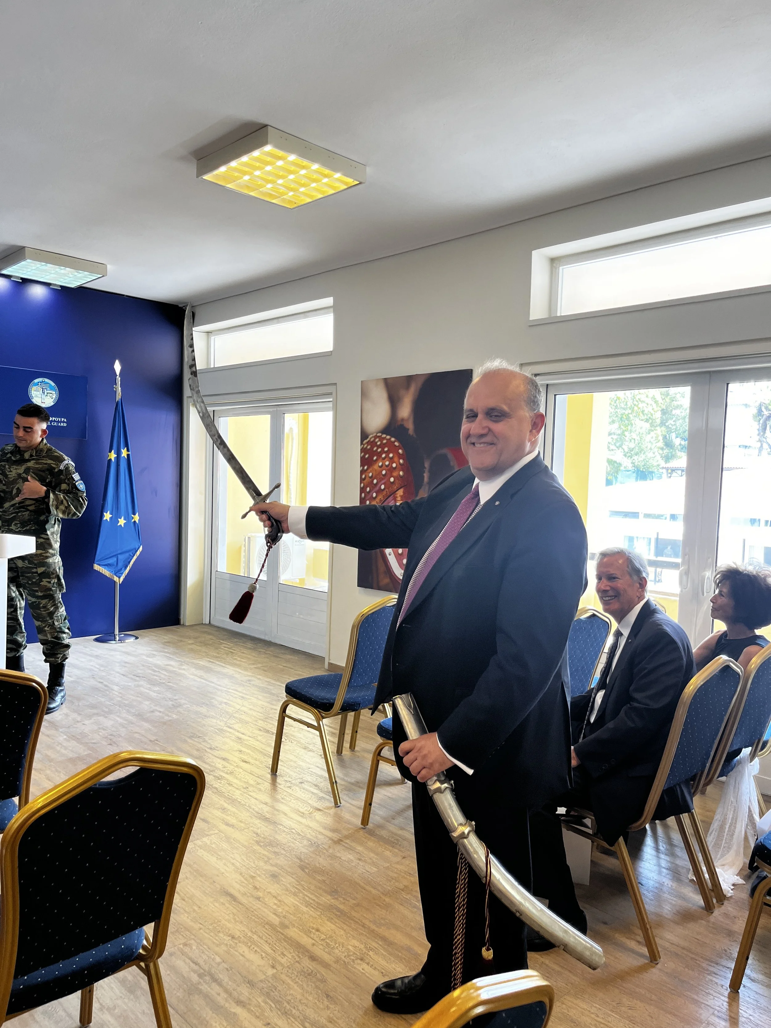  Larigakis brandishes a ceremonial Evzone officer’s sword. 