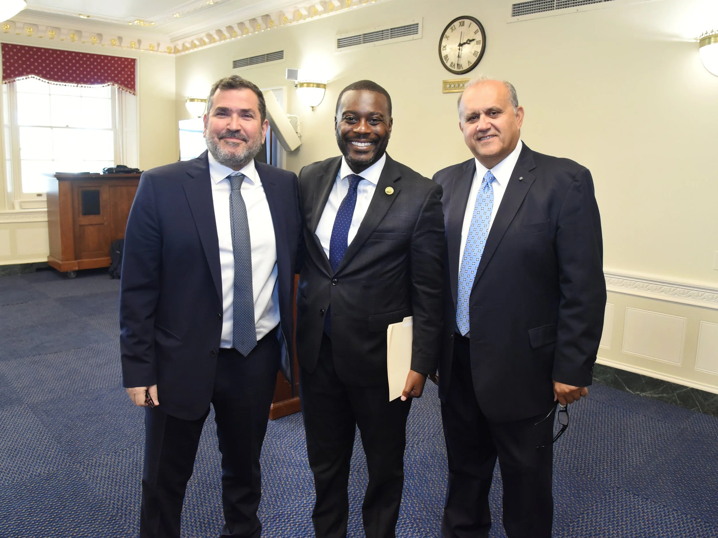  (L-R) Amb. Evangelos Savva, Rep. Gabe Amo, and Nick Larigakis. 
