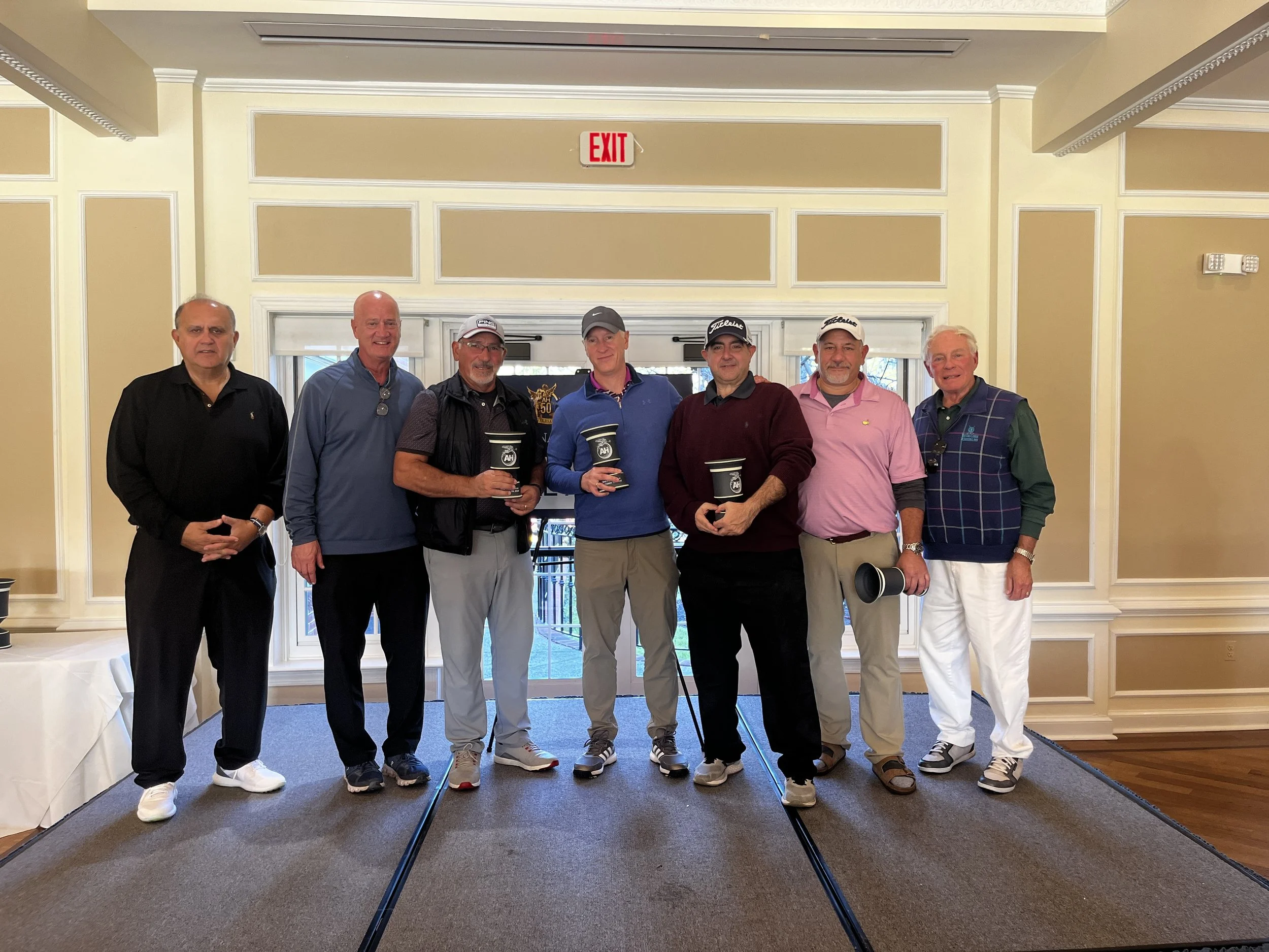  The 3rd Place Team of Alex Lyritzis, Bill Martinos, Kostas Vellios and Fotis Martinos with AHI Leadership. 