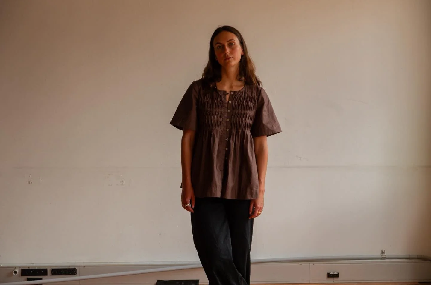 **NEW GARMENT ALERT**

The Tidal Top features delicate pintucks through the bodice, manipulated with topstitching to create subtle texture and structure. Designed with a boxy fit and gentle A-line shape, for everyday comfort. Finished with angora but