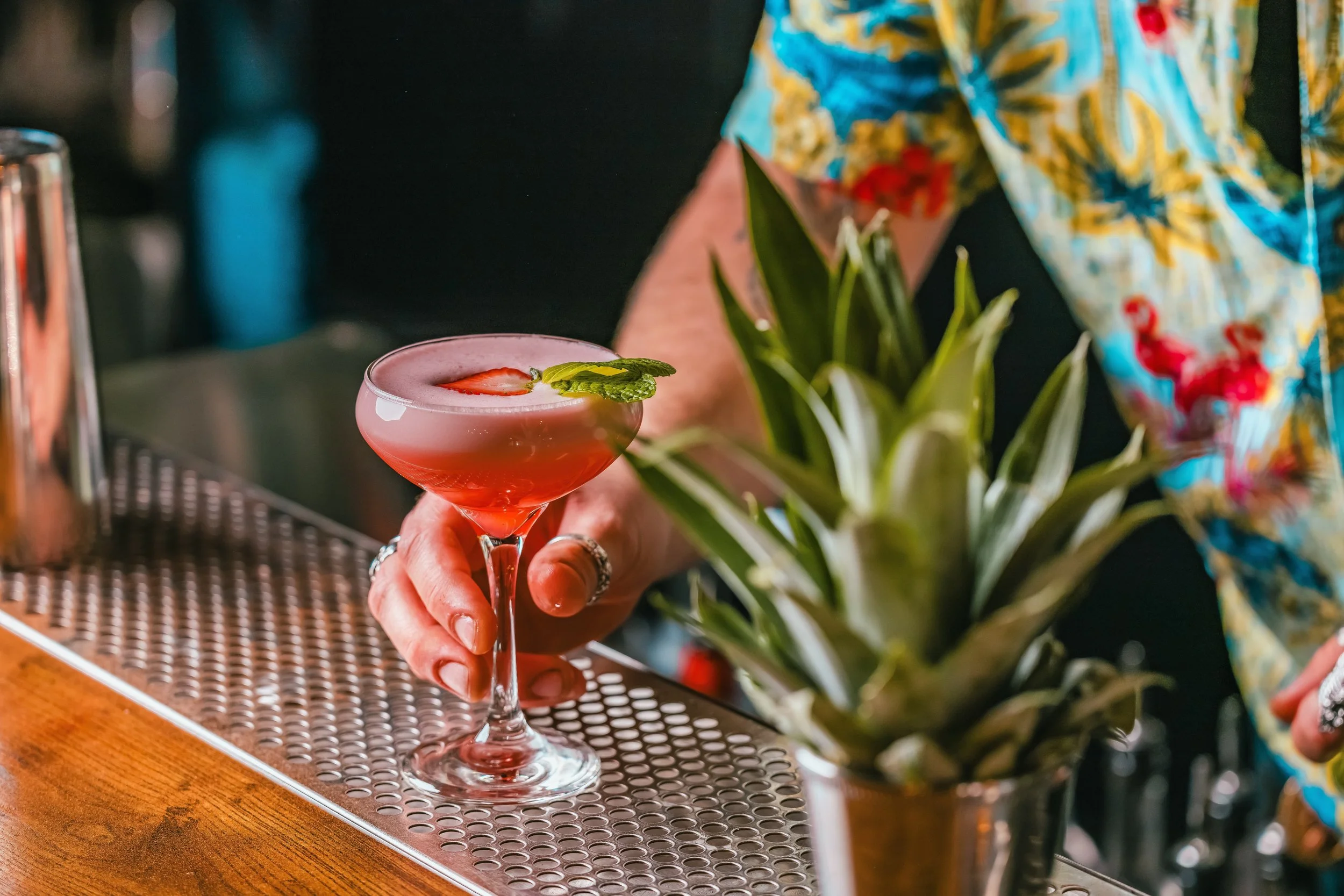 image of a cocktail on a bar, hospitality consulting services image